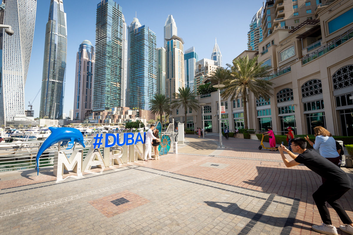 The Dubai Marina is a high-rise residential district developed along the Dubai Canal, a 2-mile long artificial canal, which was created out of the empty desert and carries sea water to/from the Persian Gulf. It is one of many residential/commercial developments in Dubai, which aim to fabricate desirable properties.
