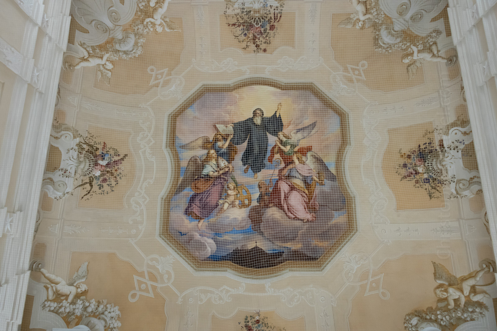 Ceiling murals in portal through St. Benedict's Hall.