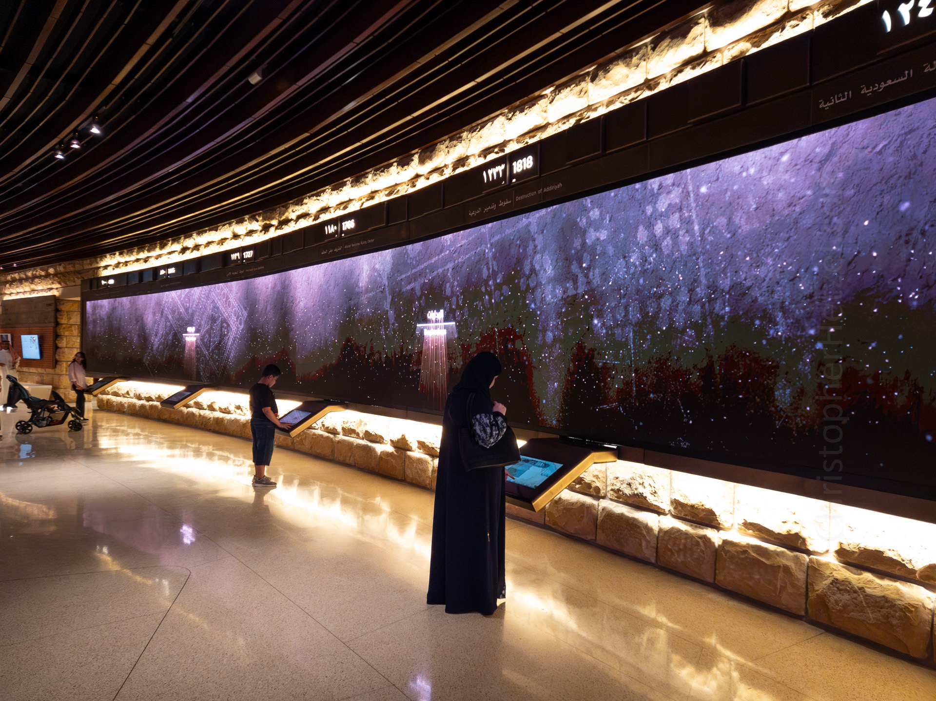 A wall display showing the chronology of history, and educational terminals.