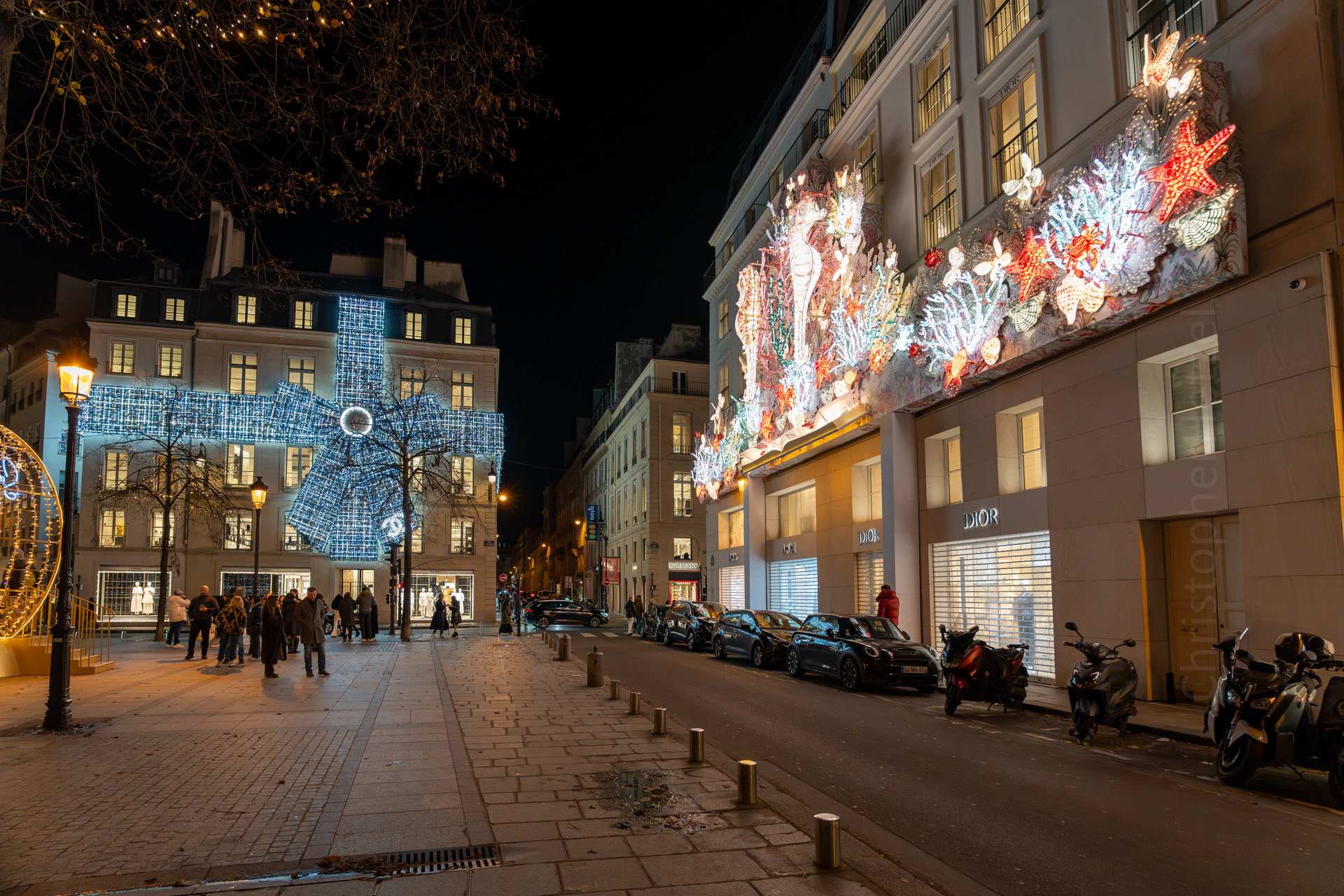 Chanel and Dior stores, located in Paris' trendy downtown fashion district. It's tradition for the major designers to put up elaborate Xmas light displays each year.