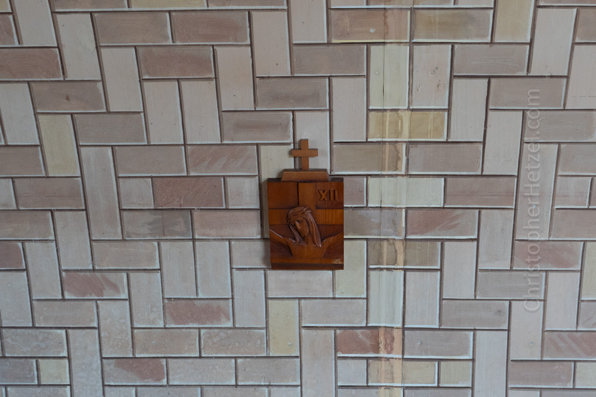 Small carvings were made to represent the 14 stations of the cross.