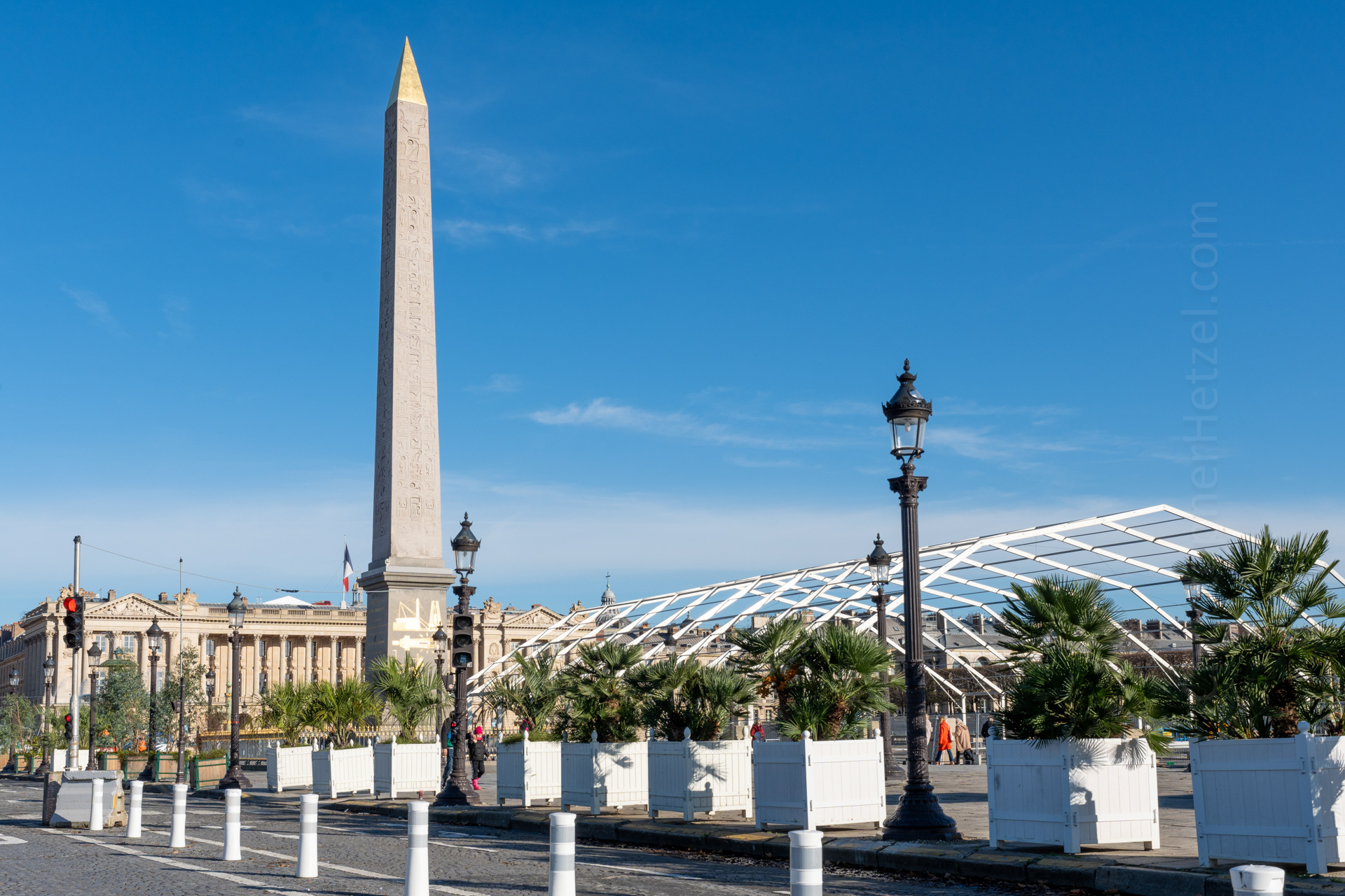 Place de la Concorde and the Egyptian obelisk. The plaza is where 100s of executions by guillotine occurred during the French Revolution. The obelisk is from Luxor in Egypt. It was donated to France centuries ago.