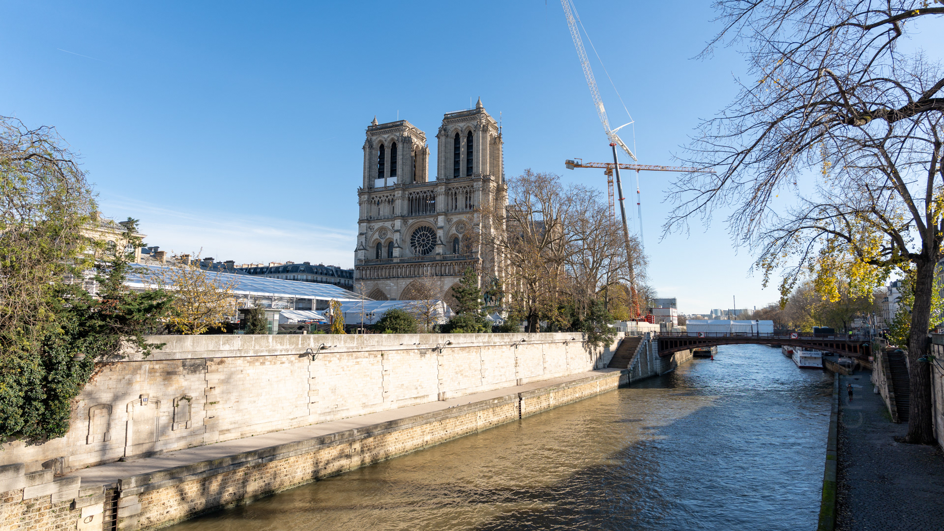 Notre Dame Cathedral along the Seine. The cathedral and grounds were closed to the public, due to the planned grand re-opening ceremony, which was to occur the day after we departed. This is one of the only clear shots of the church that I could get.