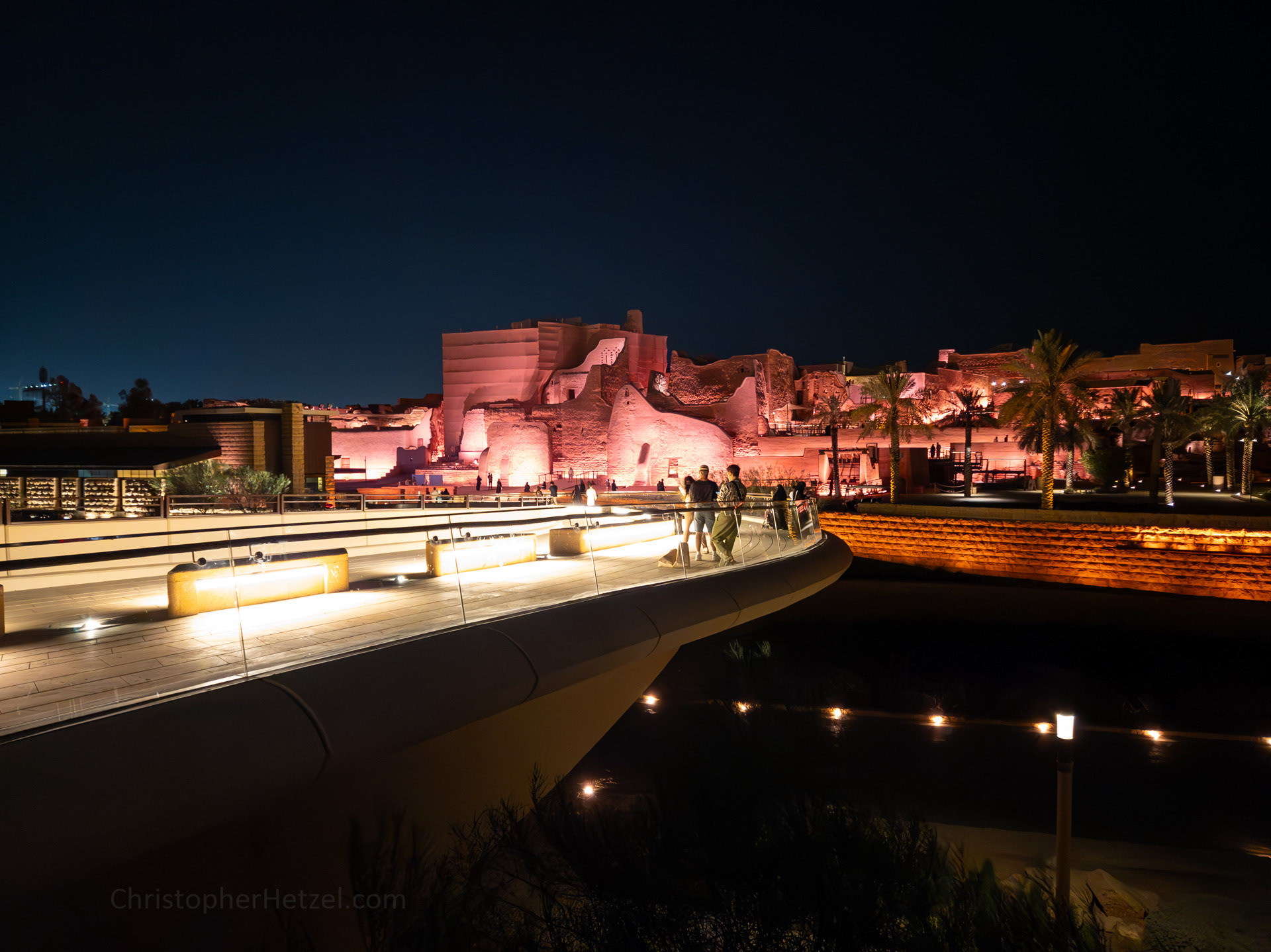 A pedestrian bridge has been built across the deep ravine of Wadi Hanifa to connect Bujairi Terrace with the ruins of At-Turaif. This is a view of At-Turaif from across the way.