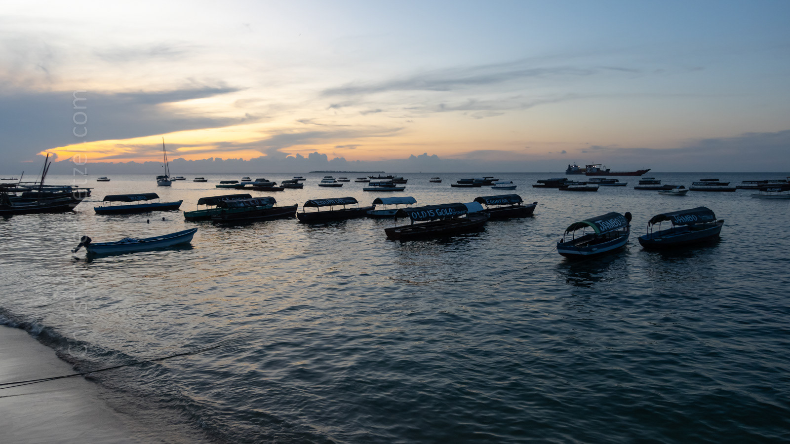 The seawall by Forodhani Gardens is the best place in Stone Town to take sunset photos.