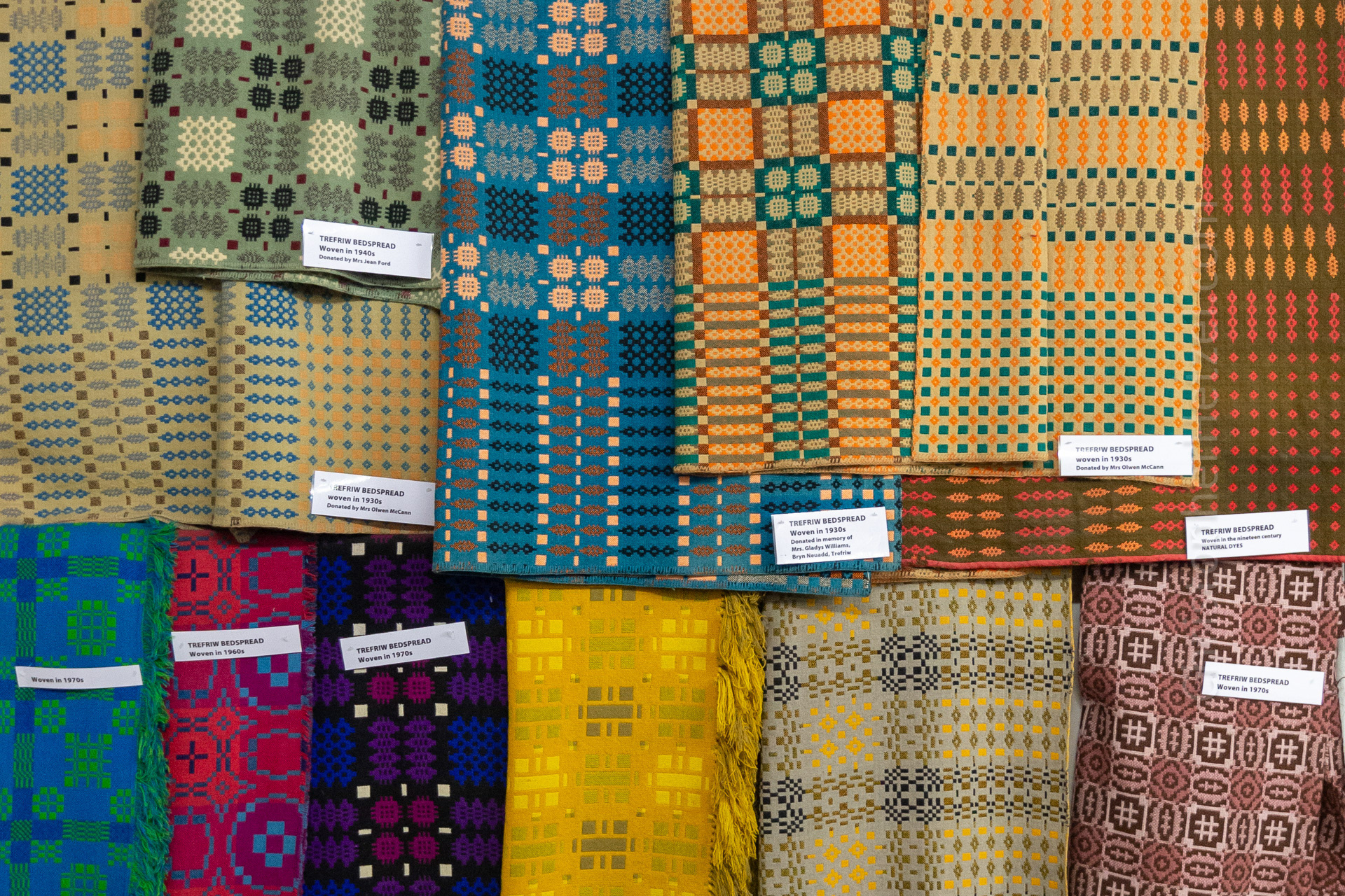 Fabrics from across the ages. The patterns are geometrical because the designs are shaft controlled. Each mill had its own signature pattern, and it's possible to identify the source of most wool fabrics as a result. Historically, there were hundreds of mills and, as people did not travel as much in the 19th century, textiles were typically produced and purchased locally, near where one lived. Most mills would have had a stall at the local weekly market.