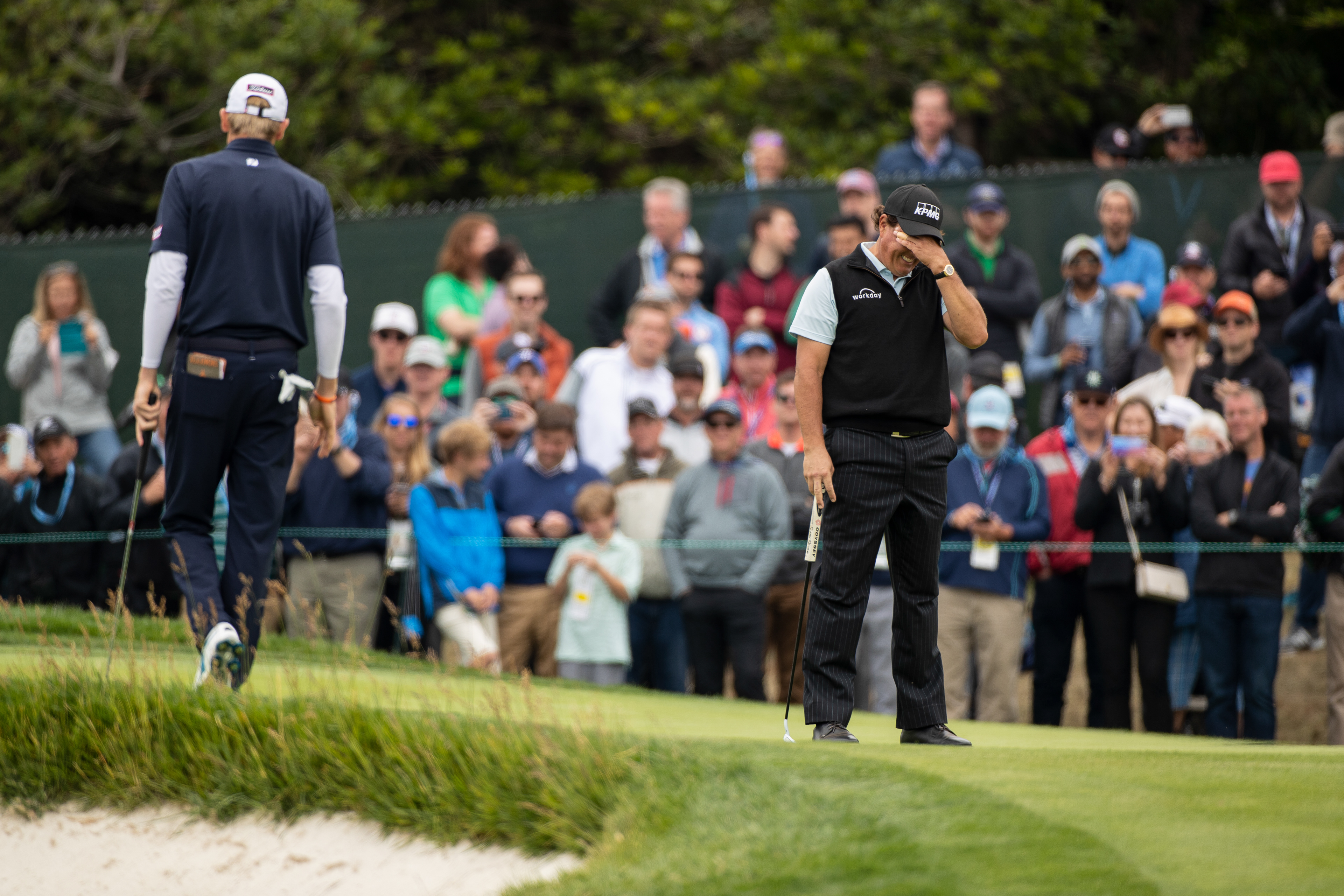 Phil Mickelson narrowly misses a putt