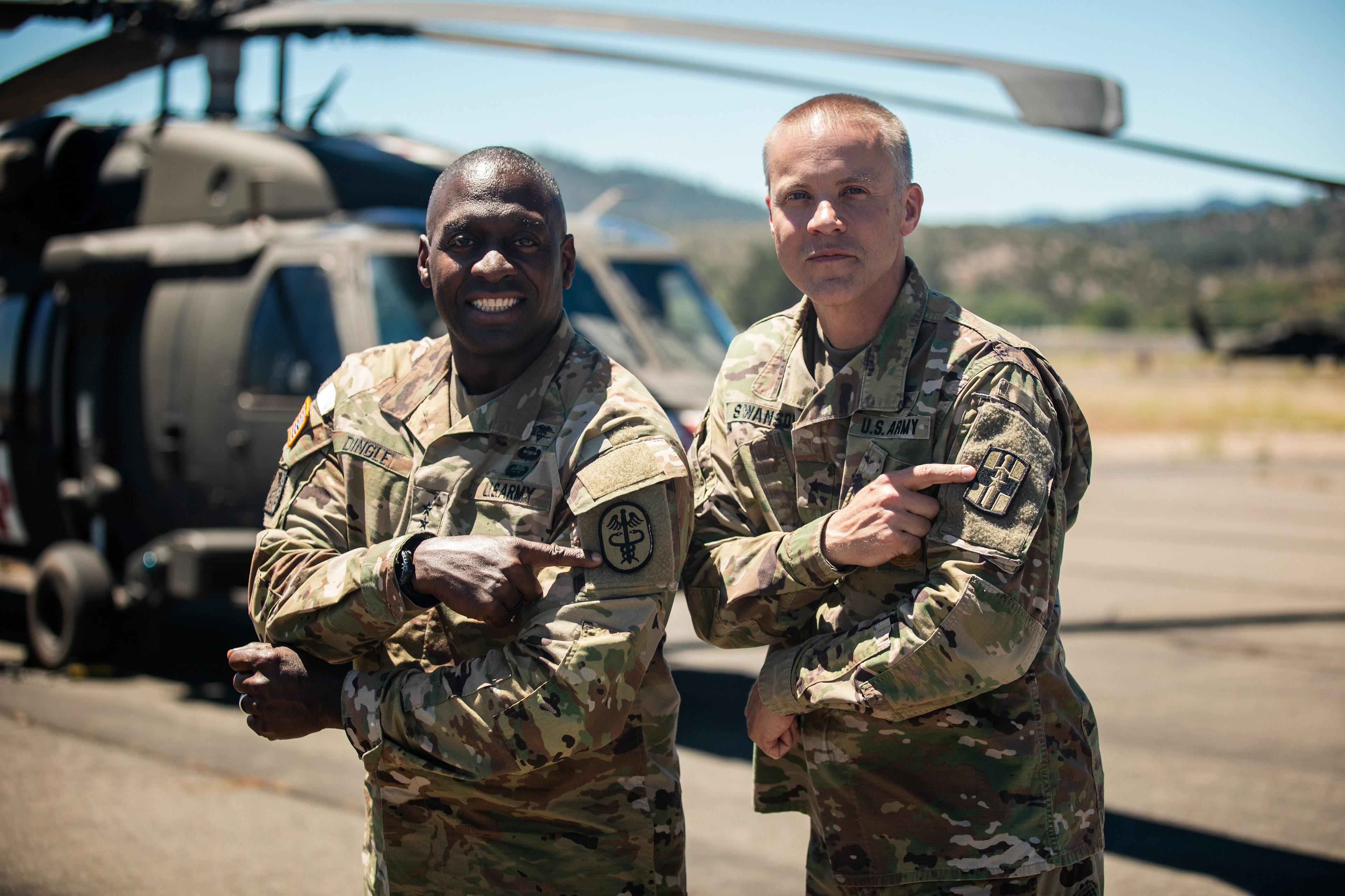 Lt. Gen. R. Scott Dingle and Brig. Gen. Peder Swanson show their Pride in the Patch.