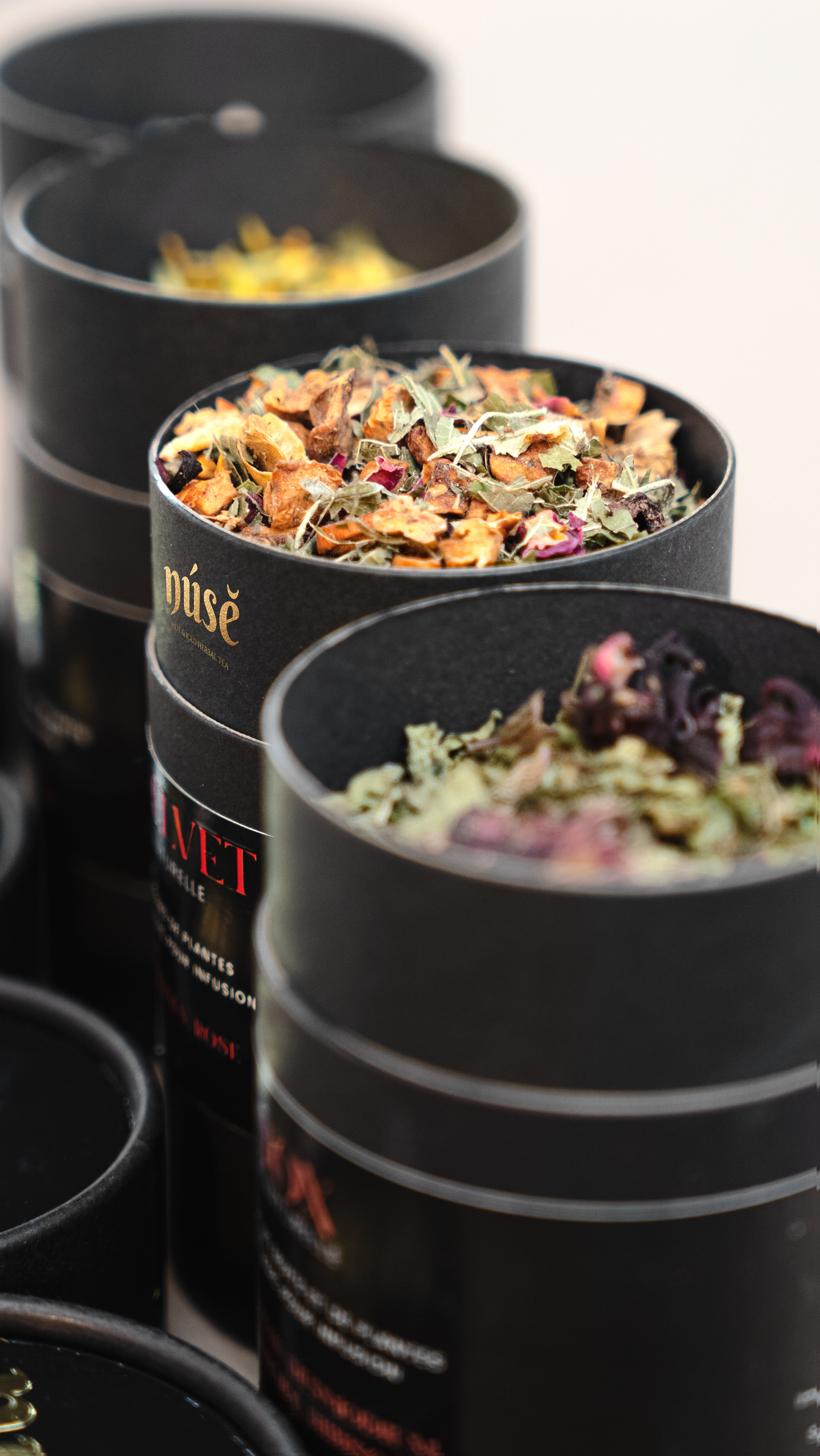 Photo commerciale de boites de thé de la marque NUSE