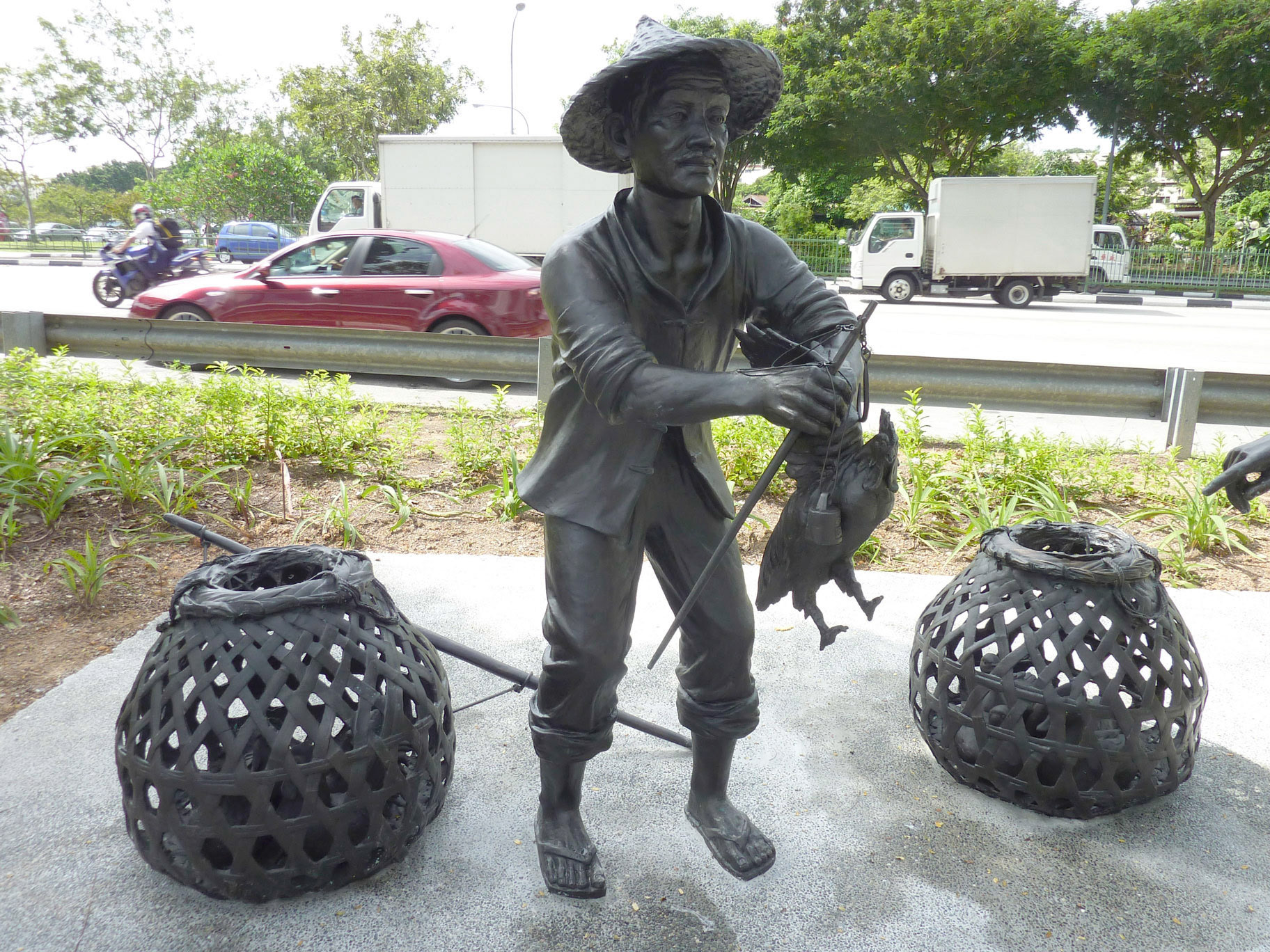 Poultry Hawker . Cast Bronze . 2010