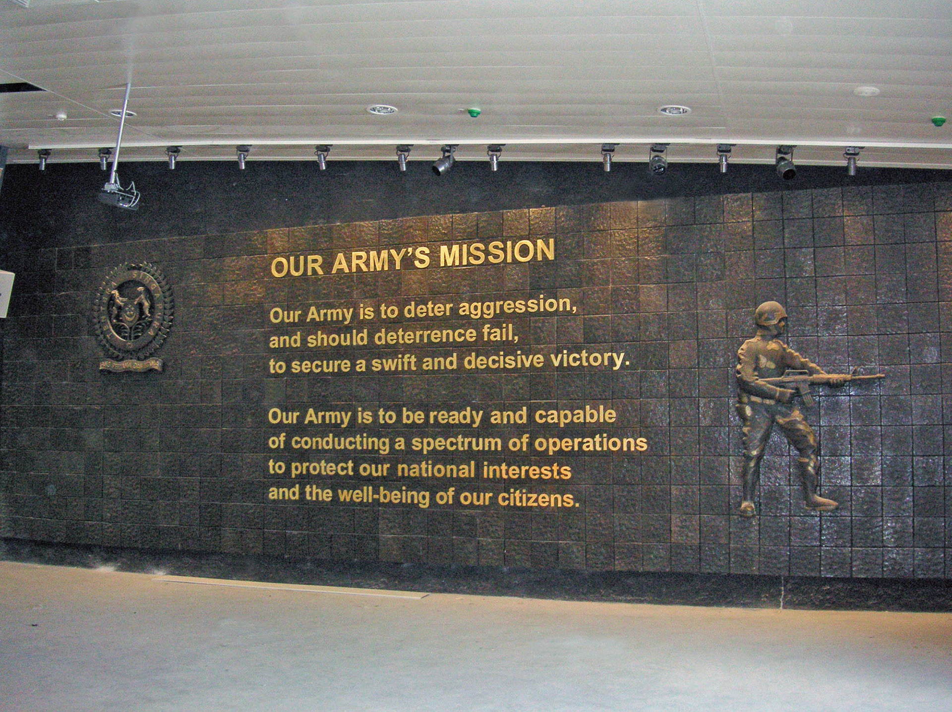 Our Army's Mission . Relief Sculptures & Letterings . Recycled Brass (bullet casing) . 2007