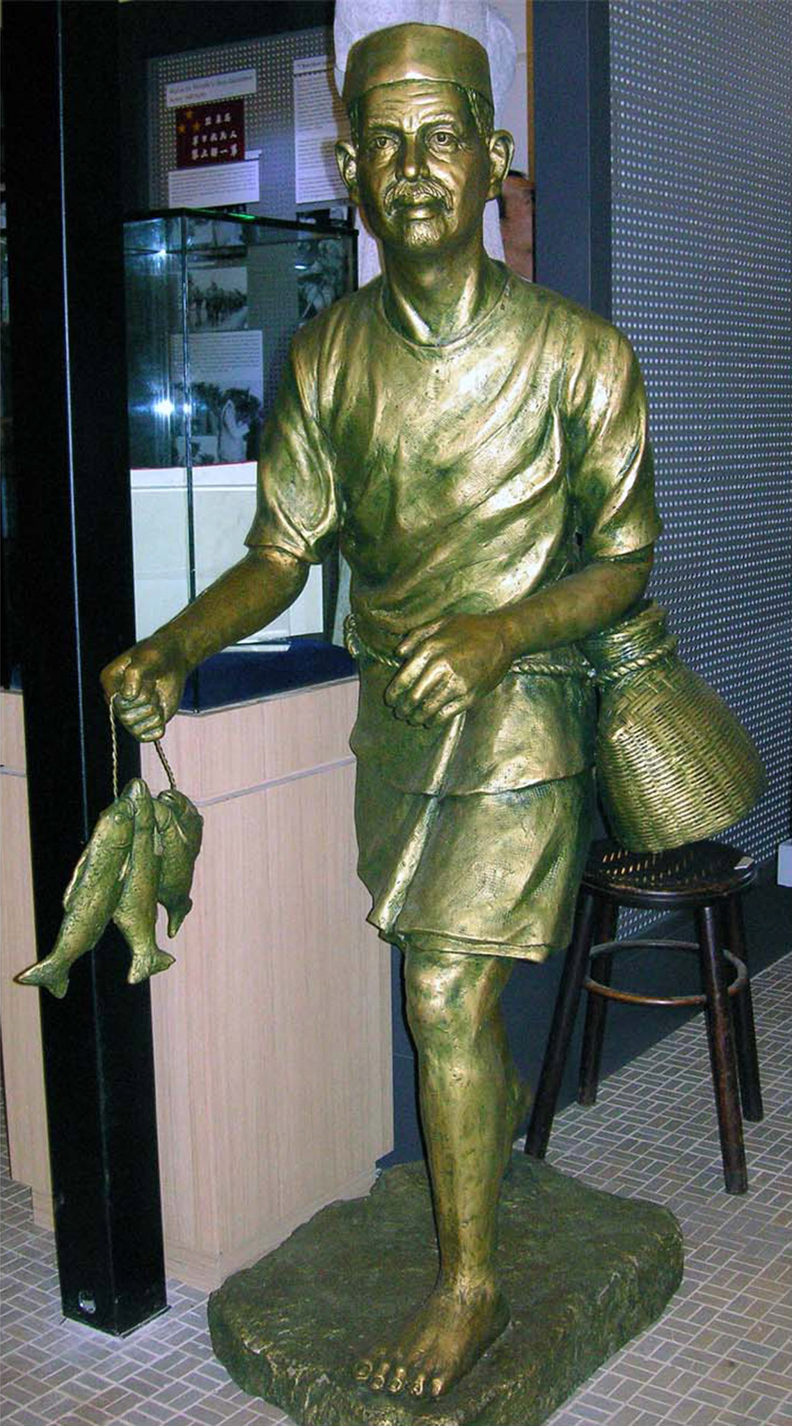 Malay Fisherman . Cast Resin with Paint