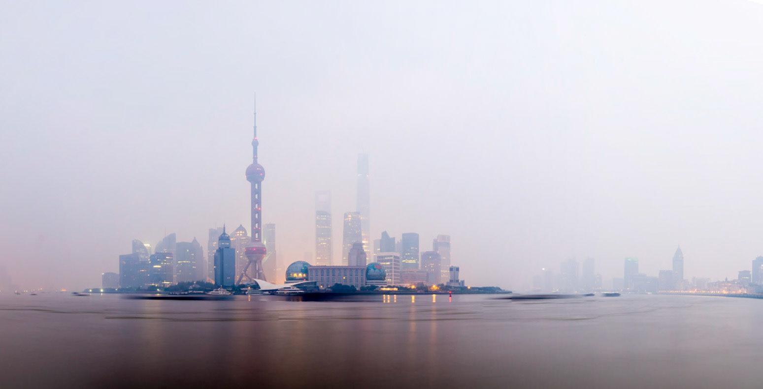Another morning over Lujiazui District in Shanghai. This morning suffered from low haze coupled with pollution to give low visibility and challenging photography conditions. This panorama shows how the haze stifles the sunrise.