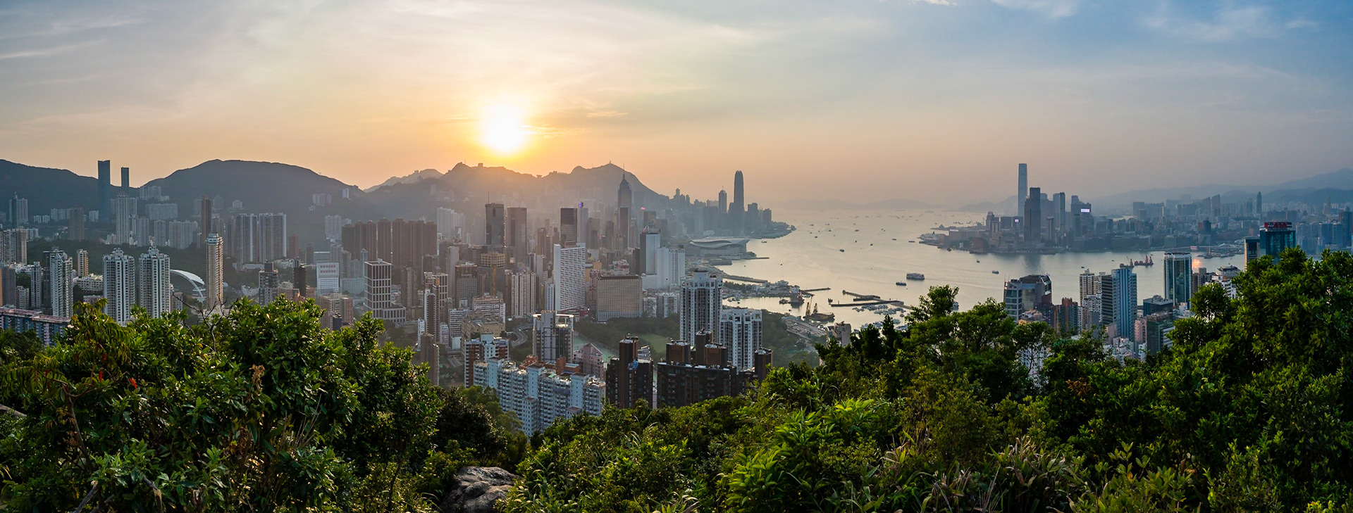 A panoramic view of Hong Kong, captured around sunset from the summit of Braemar Hill.