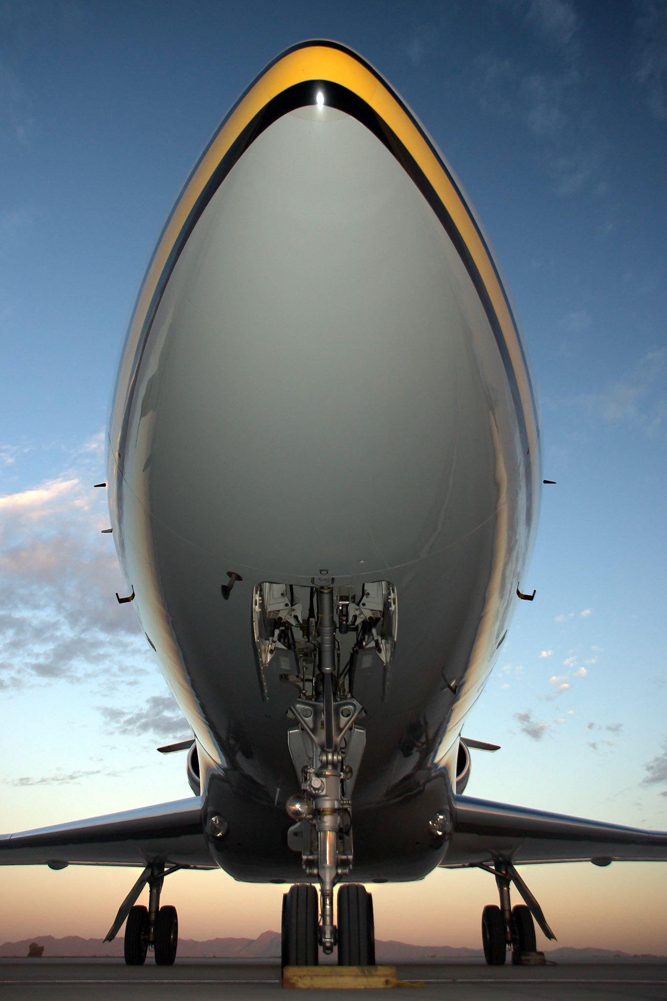 A close-up view of a Falcon 50 business jet at Phoenix Goodyear Airport.