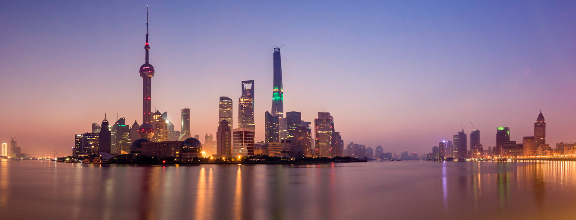 Taken from the Huangpu Park on The Bund at sunrise, this was one of the clearest mornings of the year so far. In this iconic view of modern Shanghai, you can see the Pearl Tower, distinctive Conference Centre and the new Shanghai Tower. This panorama also includes a view along the Huangpu River