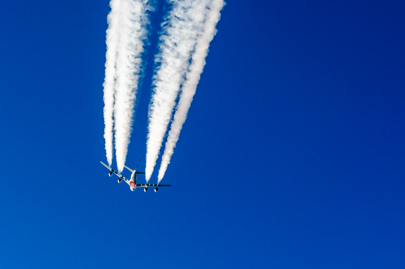 EUROPE, OCTOBER 21, 2018: An Emirates Airbus A380 in flight over Europe. Emirates is the largest operator of the A380 aircraft.