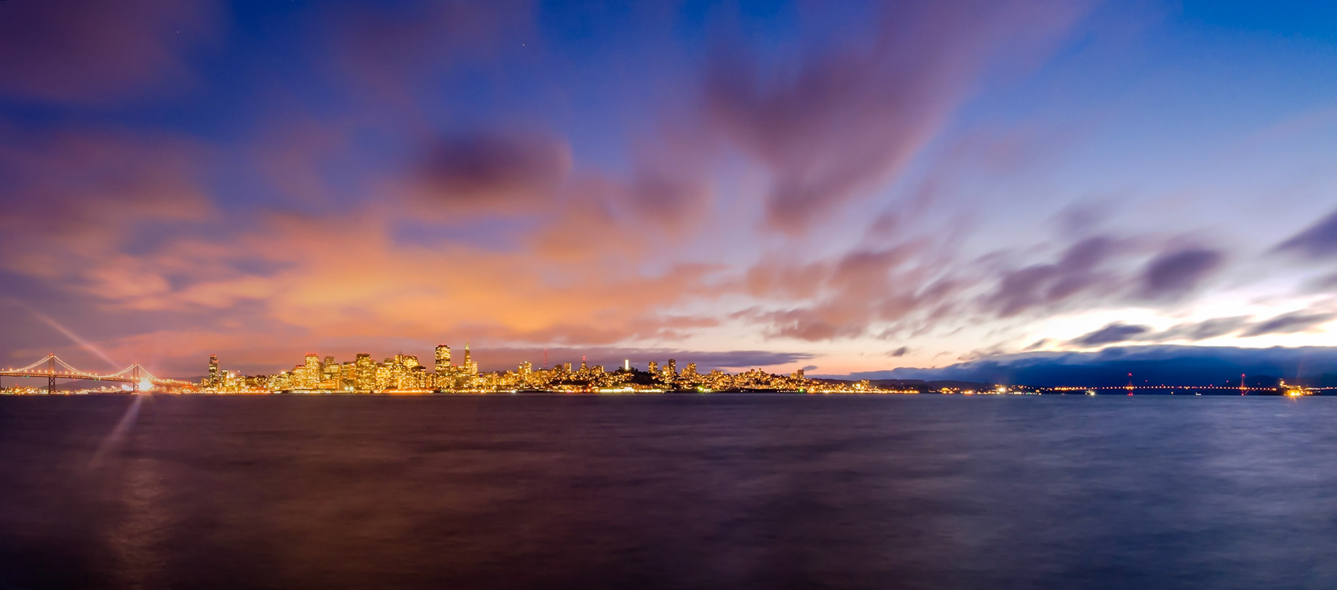 This panorama was taken from Treasure Island in San Fransisco; the Golden Gate Bridge, Downtown and Bay Bridge are visible.
