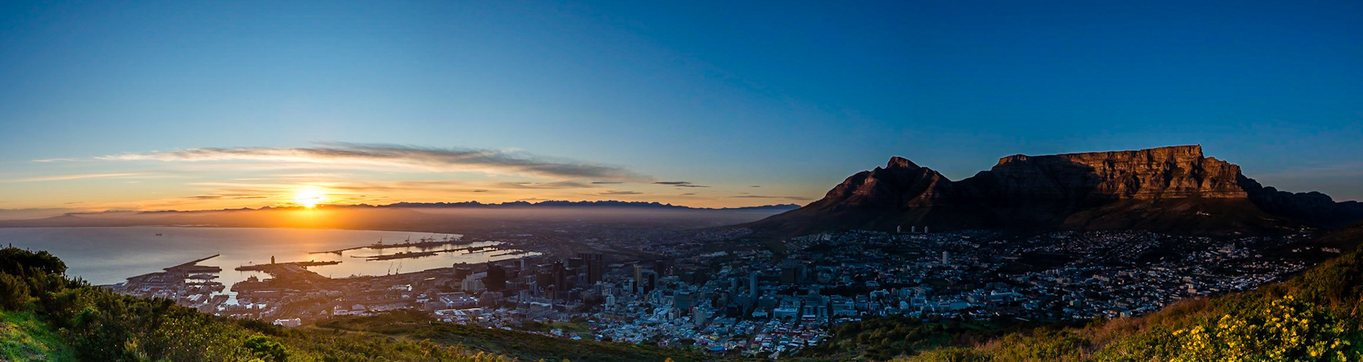 A series of pictures capturing a winter's sunrise over Cape Town, South Africa. Taken from Signal Hill overlooking the city and Table Mountain National Park.