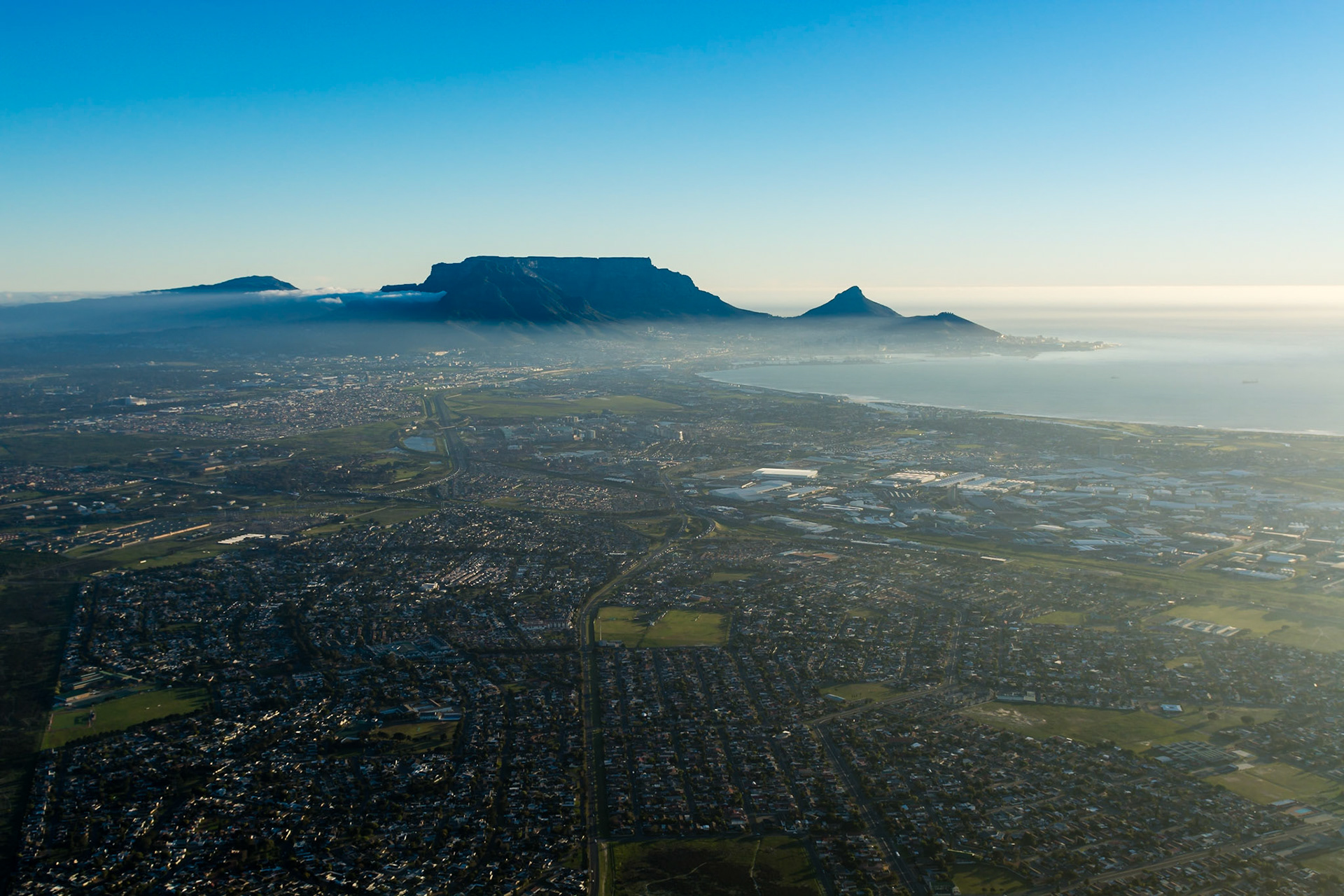 Cape Town and Table Mountain with the north-eastern suburbs in the foreground, and the city overlooked by the spectacular mountain