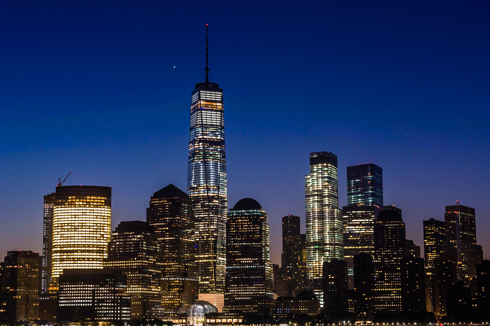 Sunrise over Manhattan, viewed from the Paulus Hook Jetty in New Jersey.