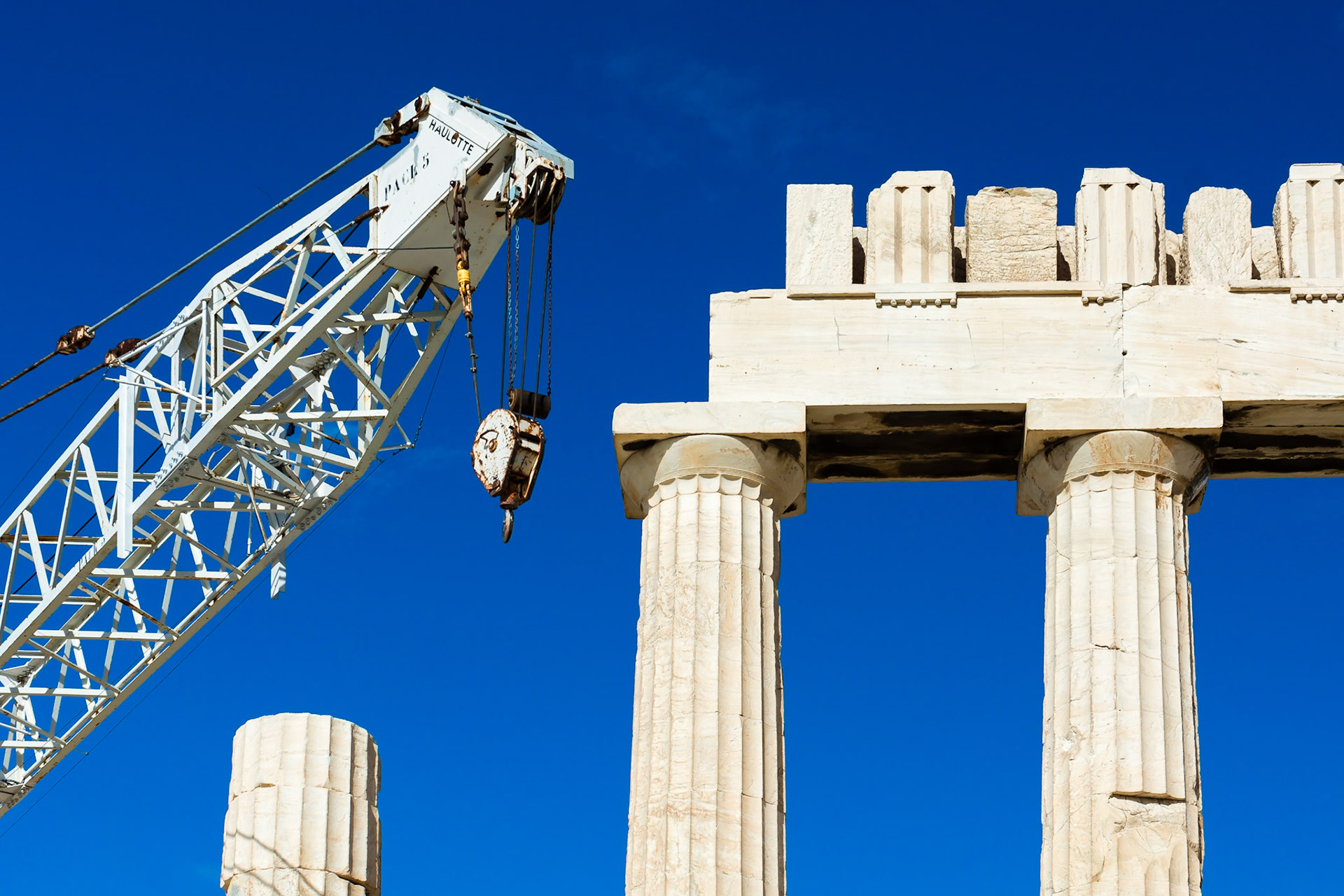 The Parthenon is a former temple dedicated to the Goddess Athena.  It is currently undergoing a programme of selective restoration and reconstruction in order to ensure the stability of the partially ruined structure.