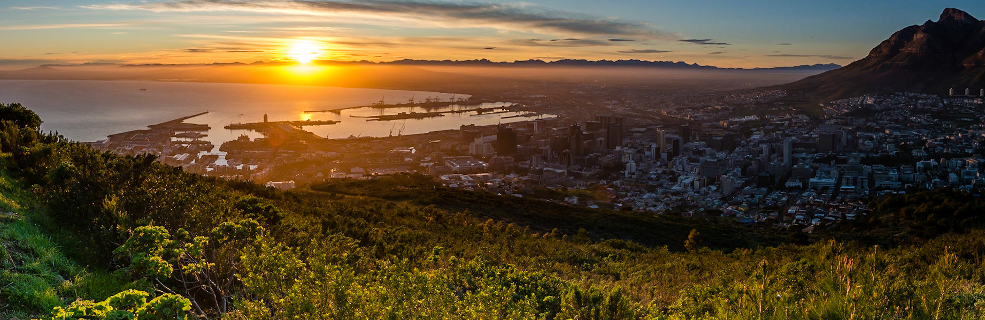 A series of pictures capturing a winter's sunrise over Cape Town, South Africa. Taken from Signal Hill overlooking the city and Table Mountain National Park.