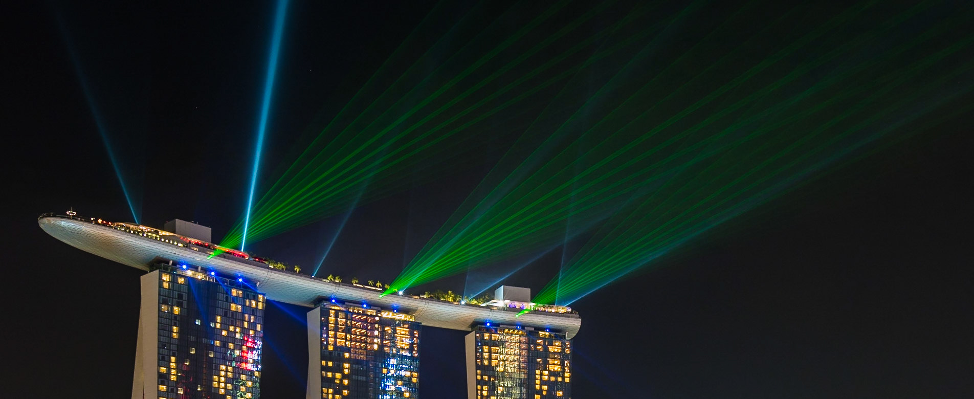 A close-up view of the laser and light show from the Marina Bay Sands towers in Singapore.
