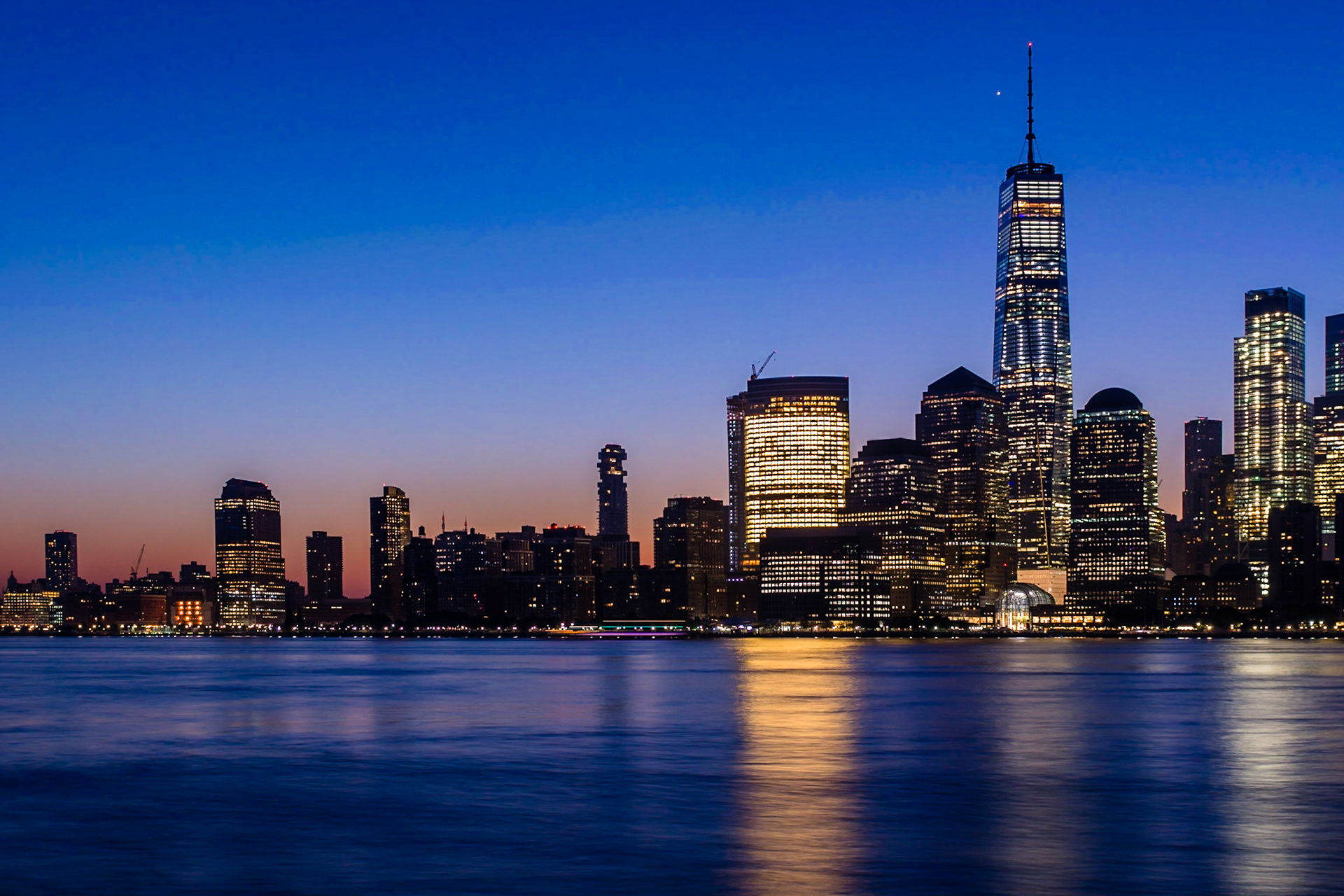 Sunrise over Manhattan, viewed from the Paulus Hook Jetty in New Jersey.