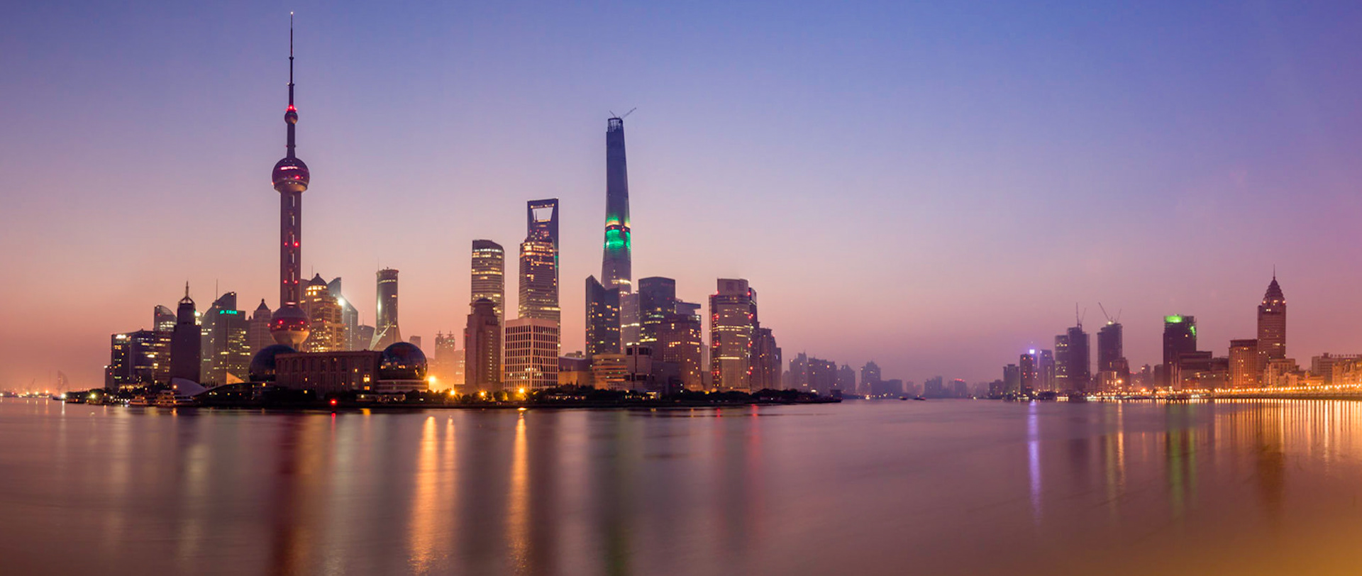 Taken from the Huangpu Park on The Bund at sunrise, this was one of the clearest mornings of the year so far. In this iconic view of modern Shanghai, you can see the Pearl Tower, distinctive Conference Centre and the new Shanghai Tower. This panorama also includes a view along the Huangpu River