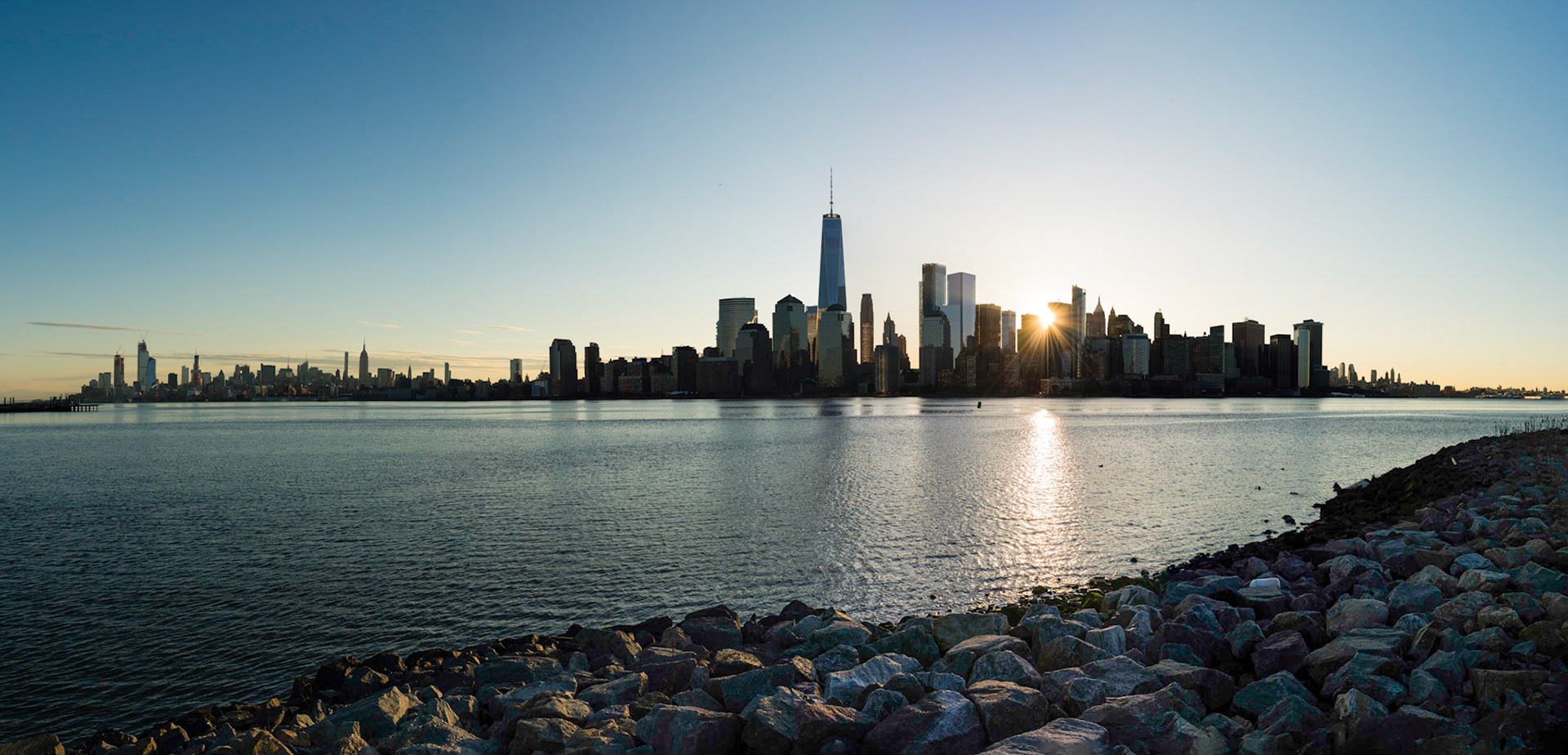 Sunrise over Manhattan, viewed from the Empty Sky Memorial in New Jersey.