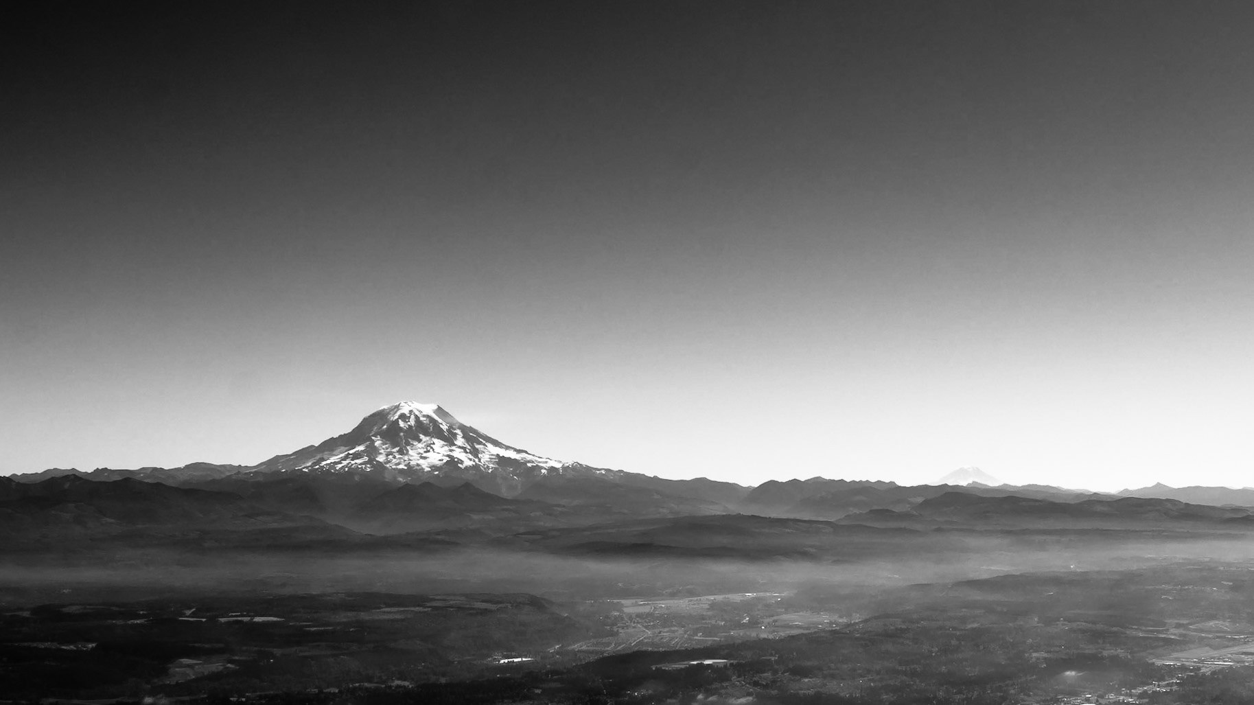 Located a couple of hours drive south of Seattle, Mount Rainier is a dormant volcano and relative of Mount St Helens (which is just visible in the background).