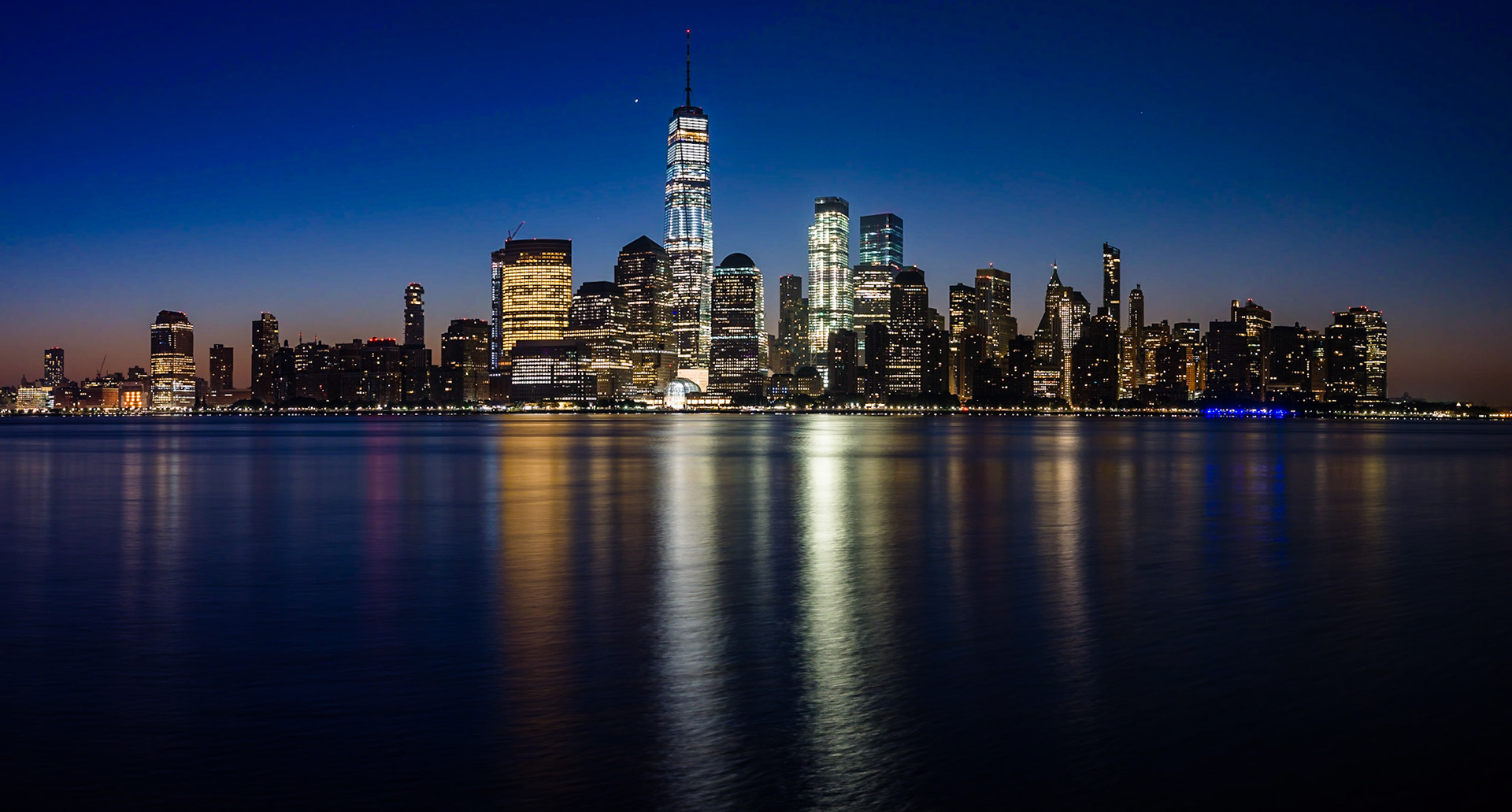 Sunrise over Manhattan, viewed from the Paulus Hook Jetty in New Jersey.