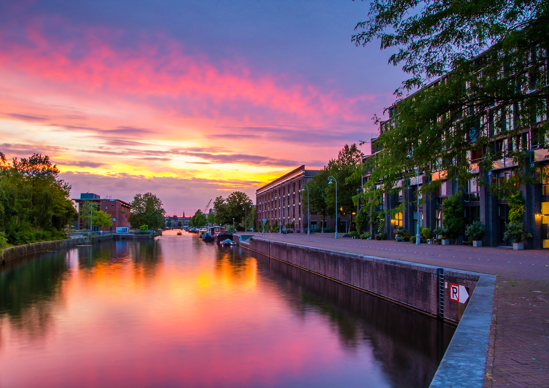 Shortly after the sun had set on Nieuwevaart canal, I moved to another location nearby- a more sheltered waterway where the reflections were beautiful. The addition of an 0.6 ND Grad filter helped to better balance the brightness of the sky and river.