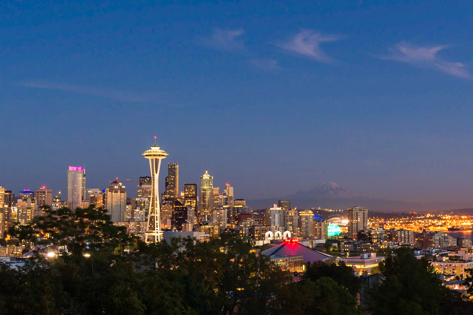 A clear autumn day in Seattle and you can see the iconic sights; the Space Needle, Mount Rainier and Downtown, At sunset this location- Kerry Park- is almost overrun by tourists.