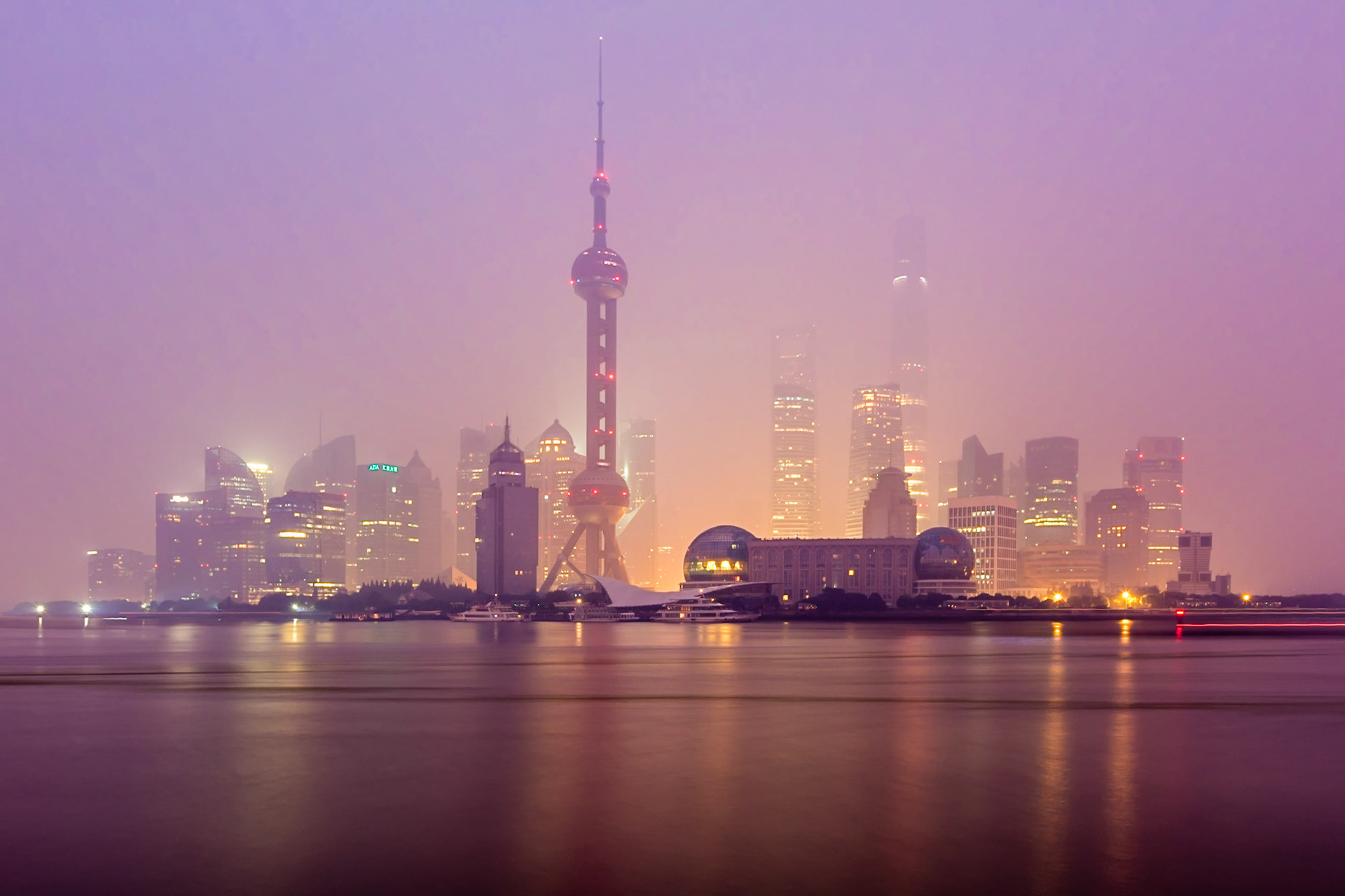 Another morning over Lujiazui District in Shanghai. This morning suffered from low haze coupled with pollution to give low visibility and challenging photography conditions.