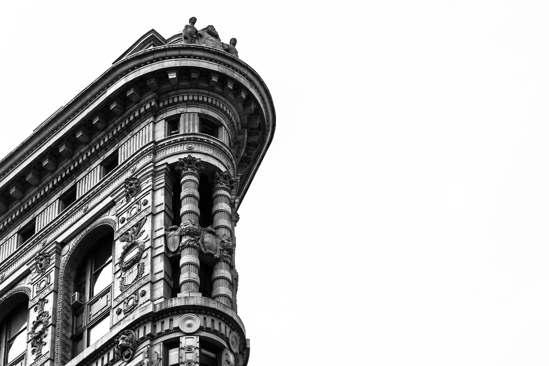 A close-up of detail on the Flatiron Building in New York. Converted to black and white and added contrast for a high-key effect.