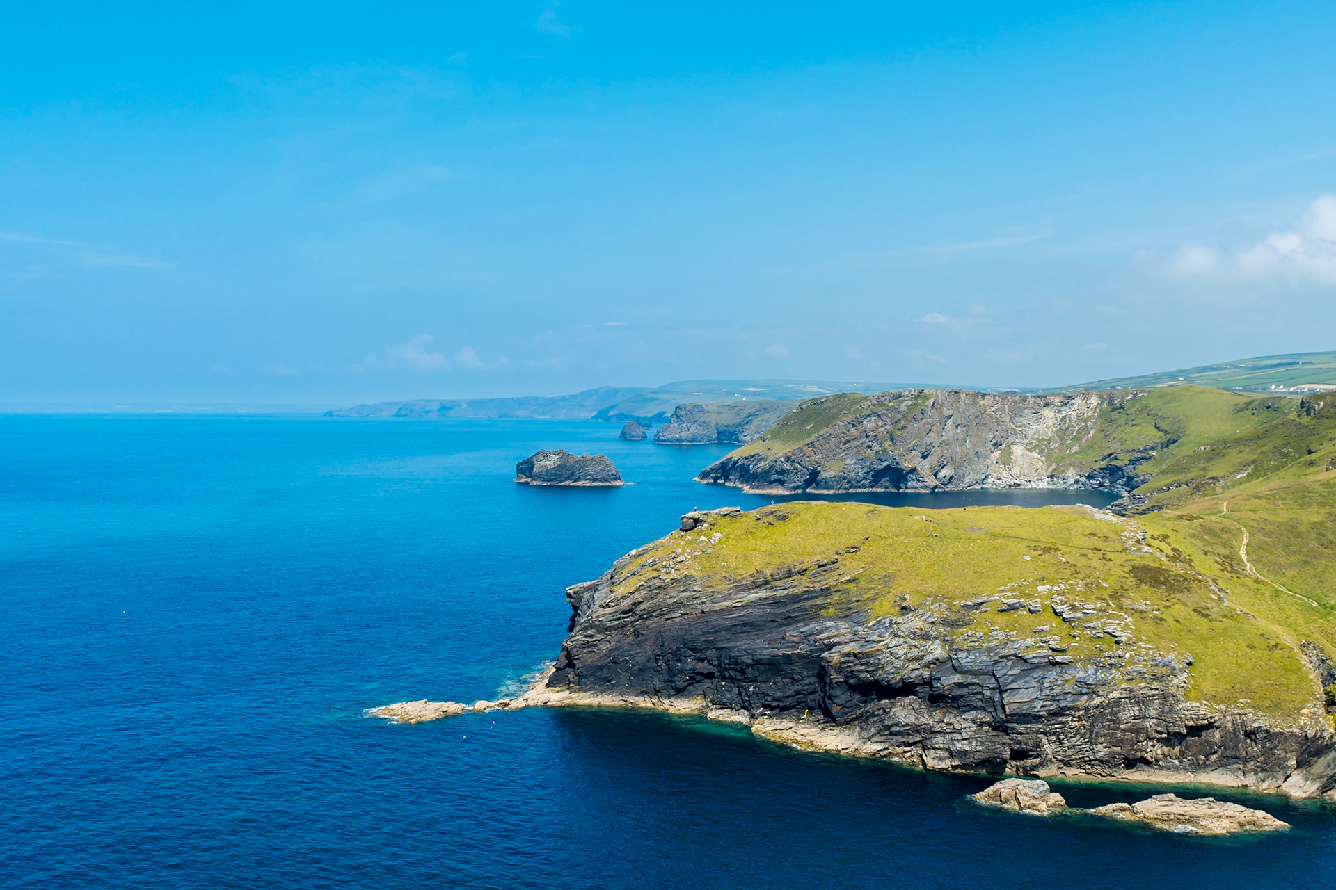 This is the view of the coastline looking north from Tintagel Castle in Cornwall. The rugged cliffs have been the site of many shipwrecks.