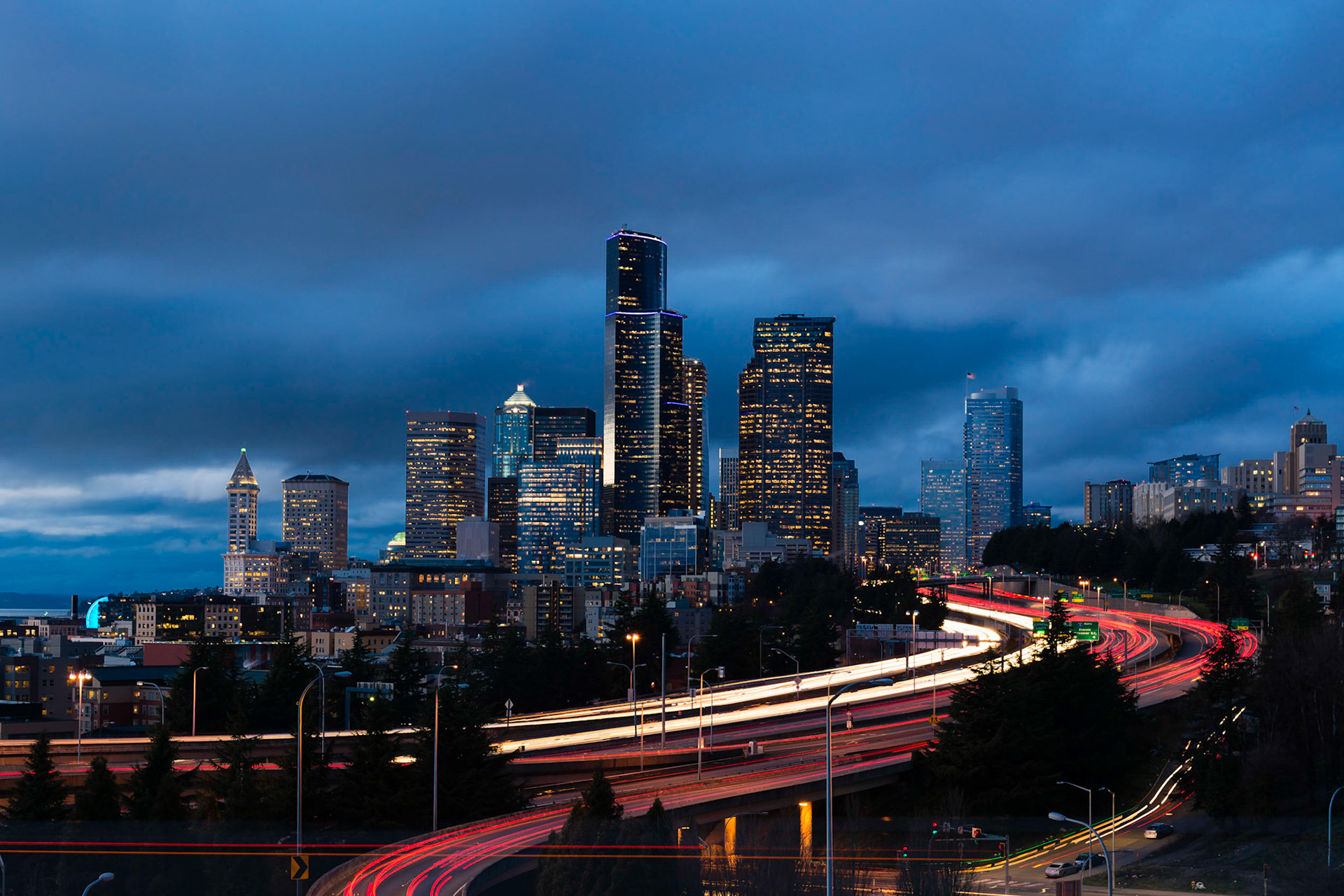 Traffic is busy in Seattle shortly after sunset. This picture is a composite of 5 images.
