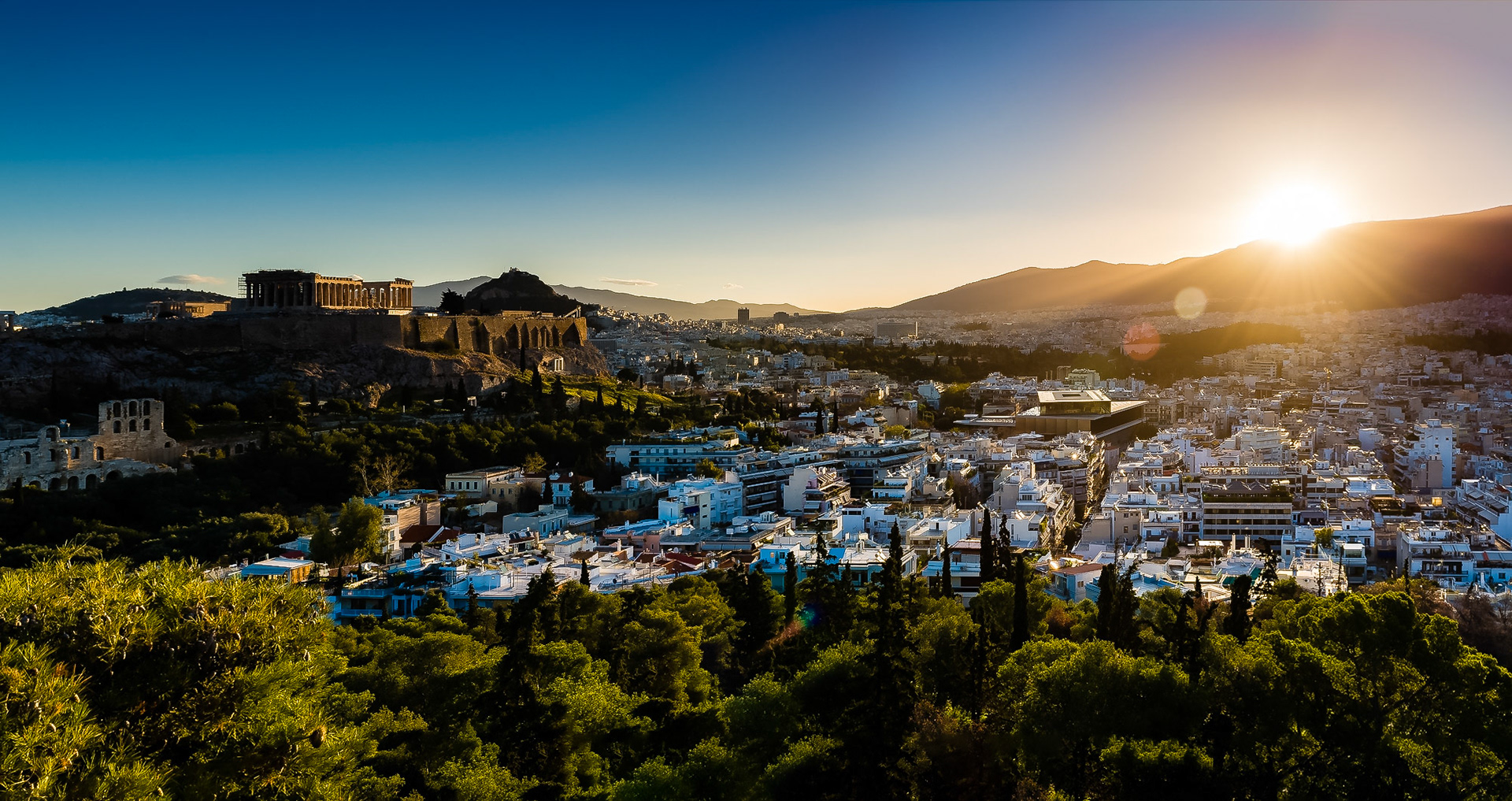 Sunrise over Athens, Greece, viewed from Philopappos Hill.