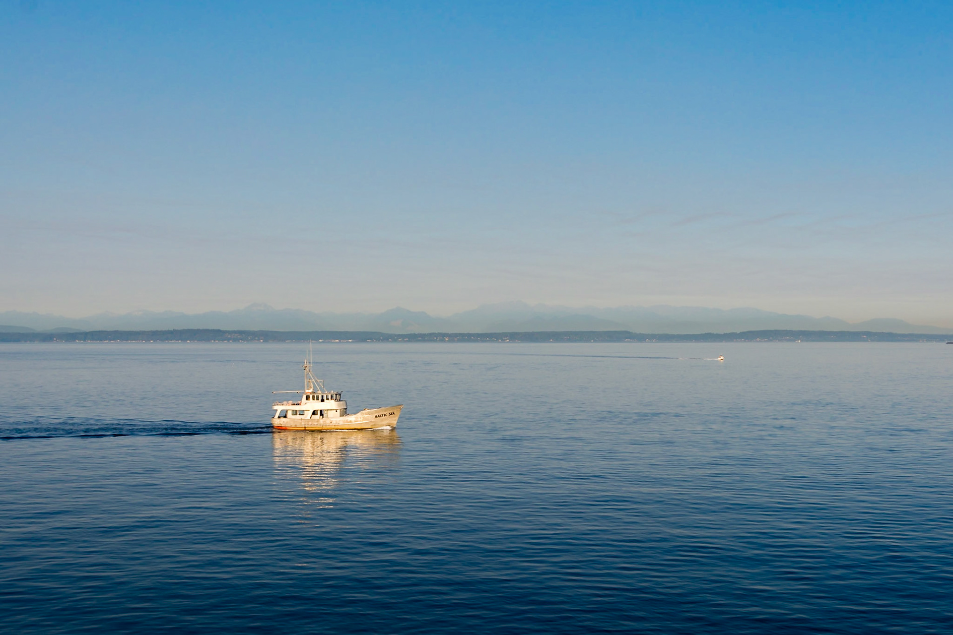On this beutiful day in Seattle, I loved the way the colours of this boat- called 'Baltic Sea'- contrasted with the deep-blue of the bay.