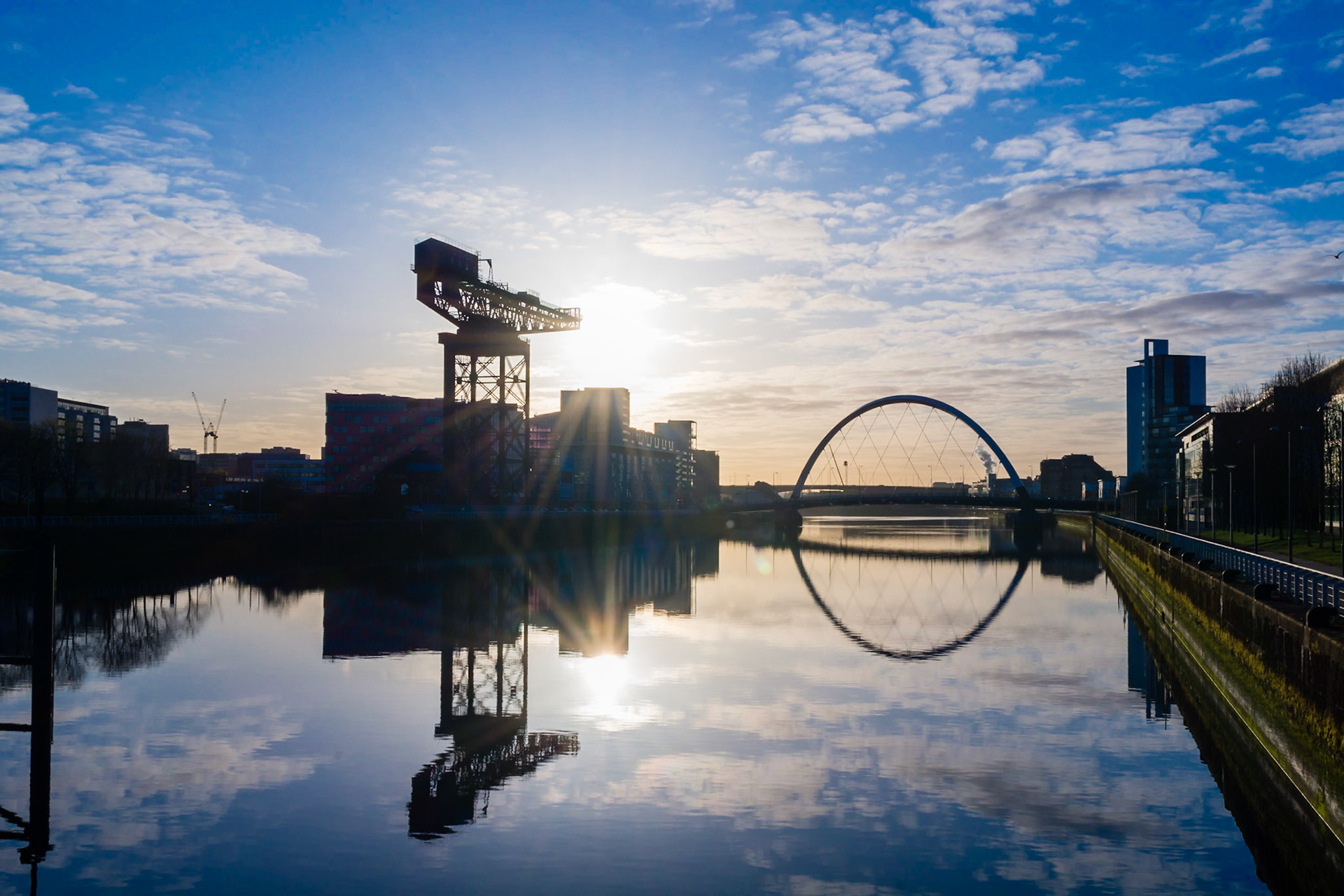 The view from Bells Bridge, Glasgow, during a springtime sunrise. Including the SSE Hydro, Finnieston Crane and Glasgow Eye bridge.