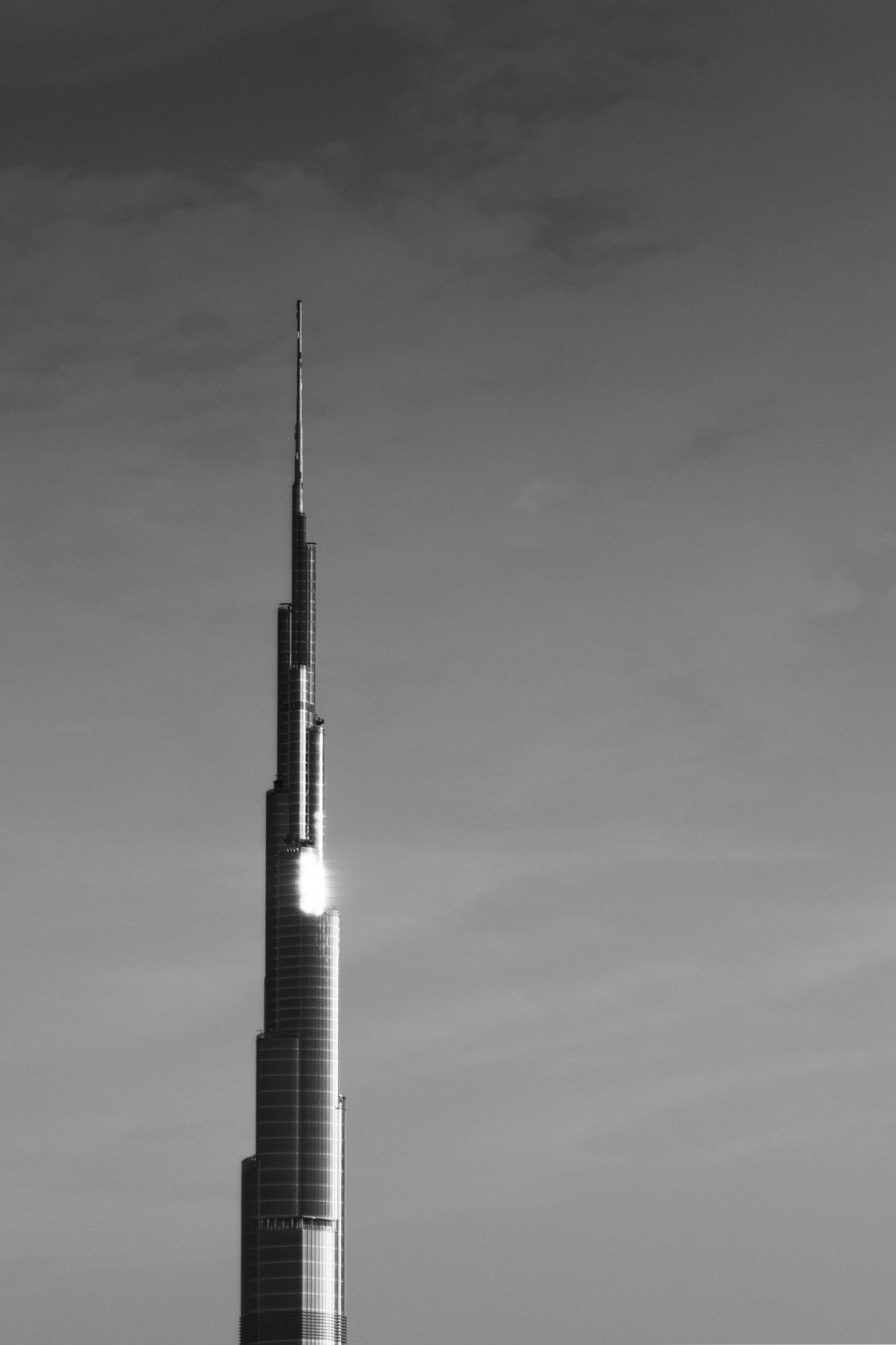 After a day of poor visibility, the sky cleared enough in the afternoon to provide a beautiful sunset over Dubai. The view looks southbound, past the Dubai International Finance Centre and Burj Khalifa towards the Burj Al Arab and Dubai Marina.