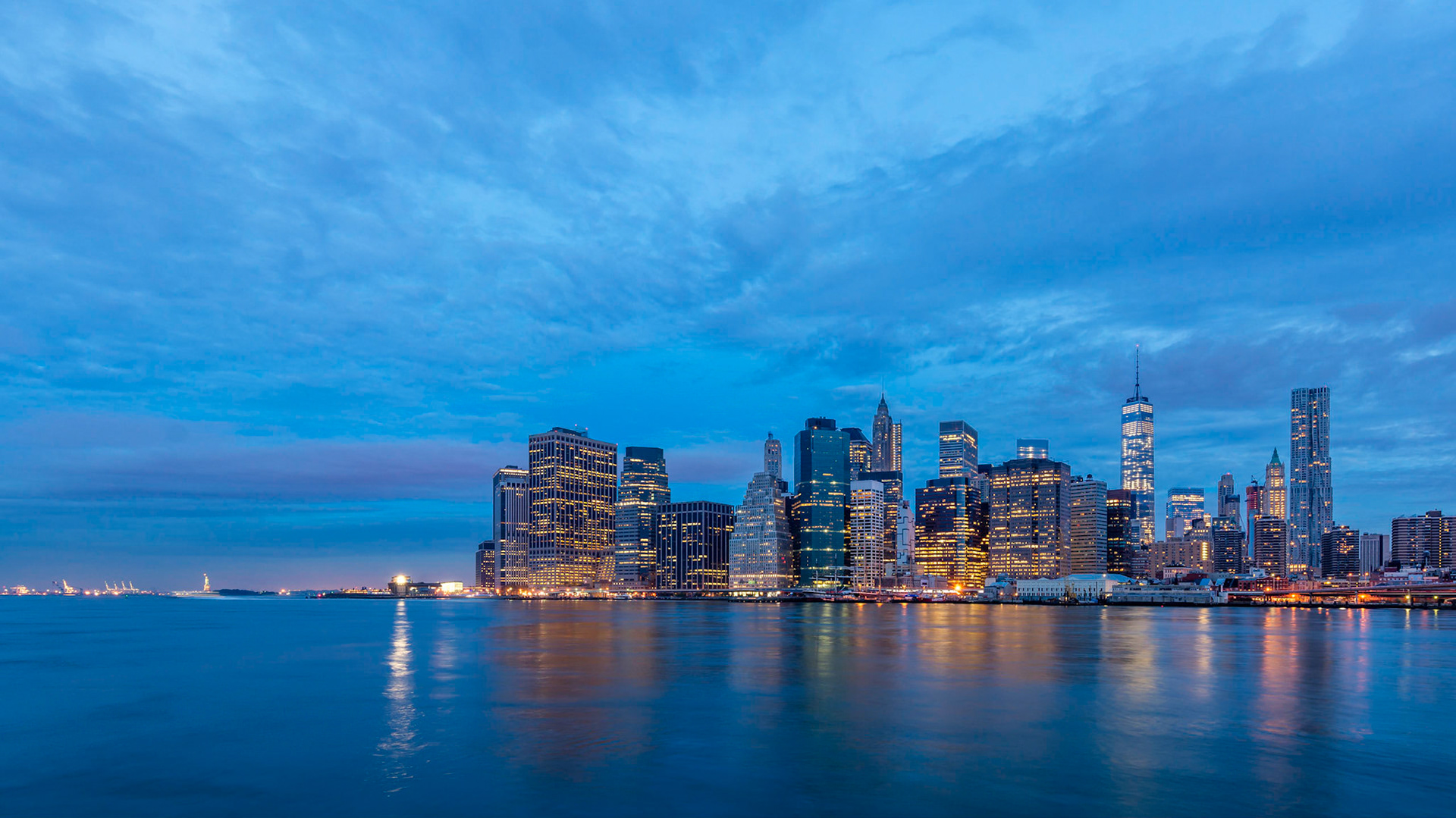I took an early ride to Brooklyn to capture the sunrise over Manhattan and the Statue of Liberty (on the left). I have enough images for a much wider panorama than this but Photoshop can't seem to merge them correctly...