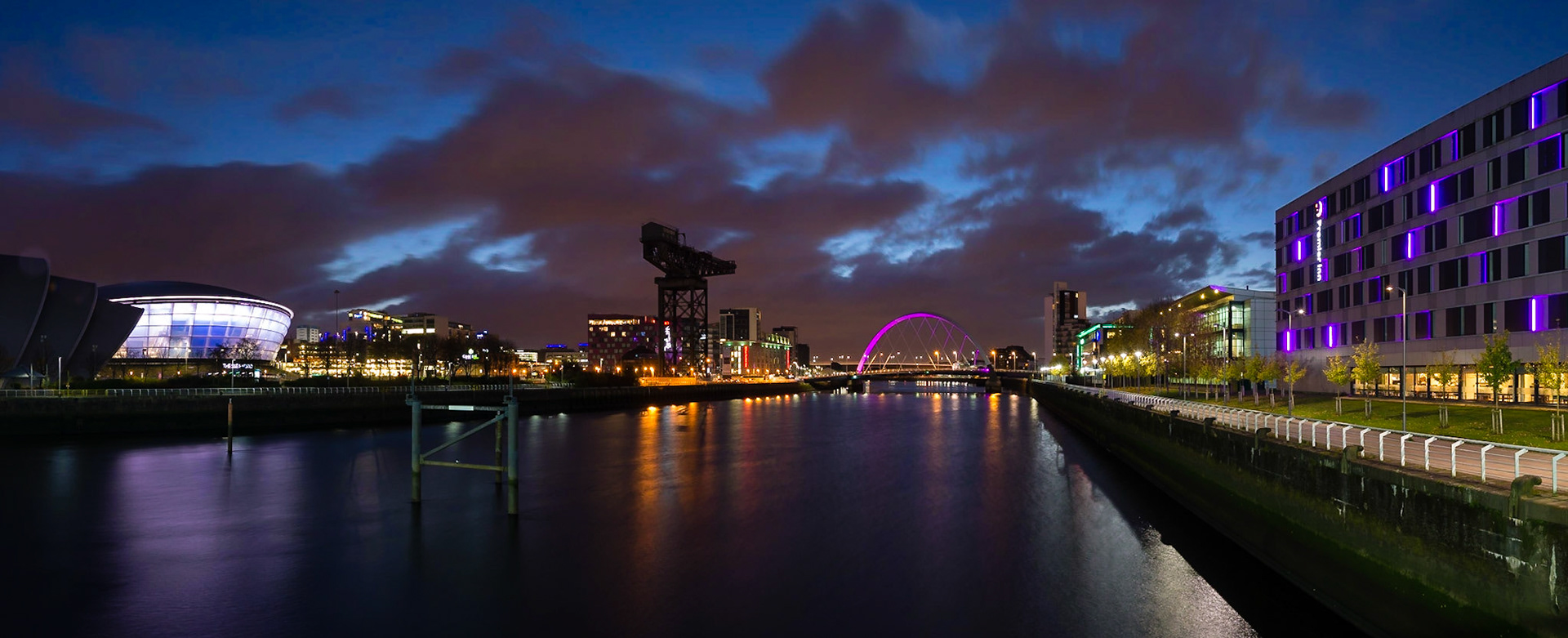 Sunrise on the River Clyde, featuring the Glasgow skyline, FInneston Crane and Clyde Arc.