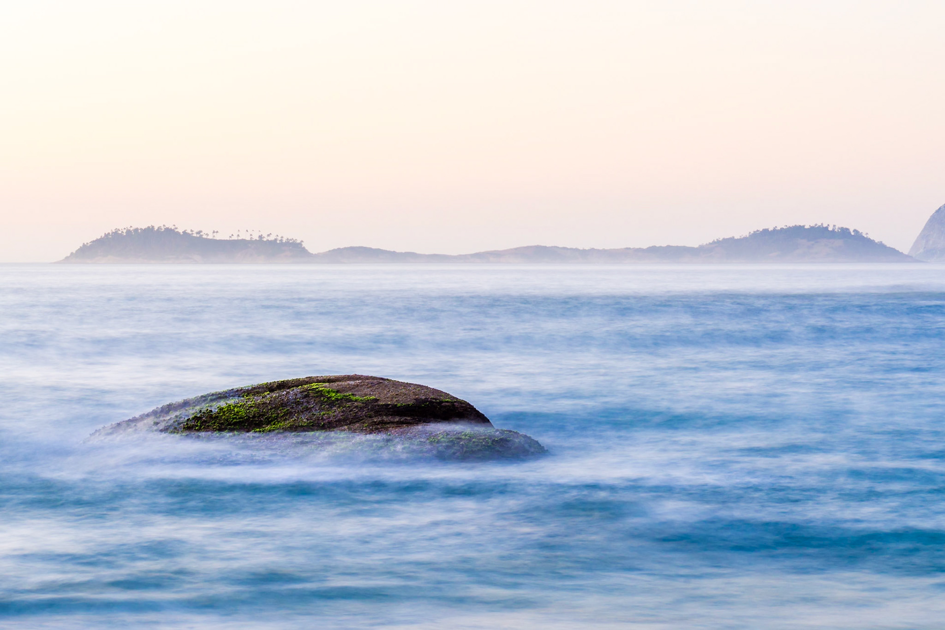 The sea and a slower shutter speed give a dreamy effect to the image