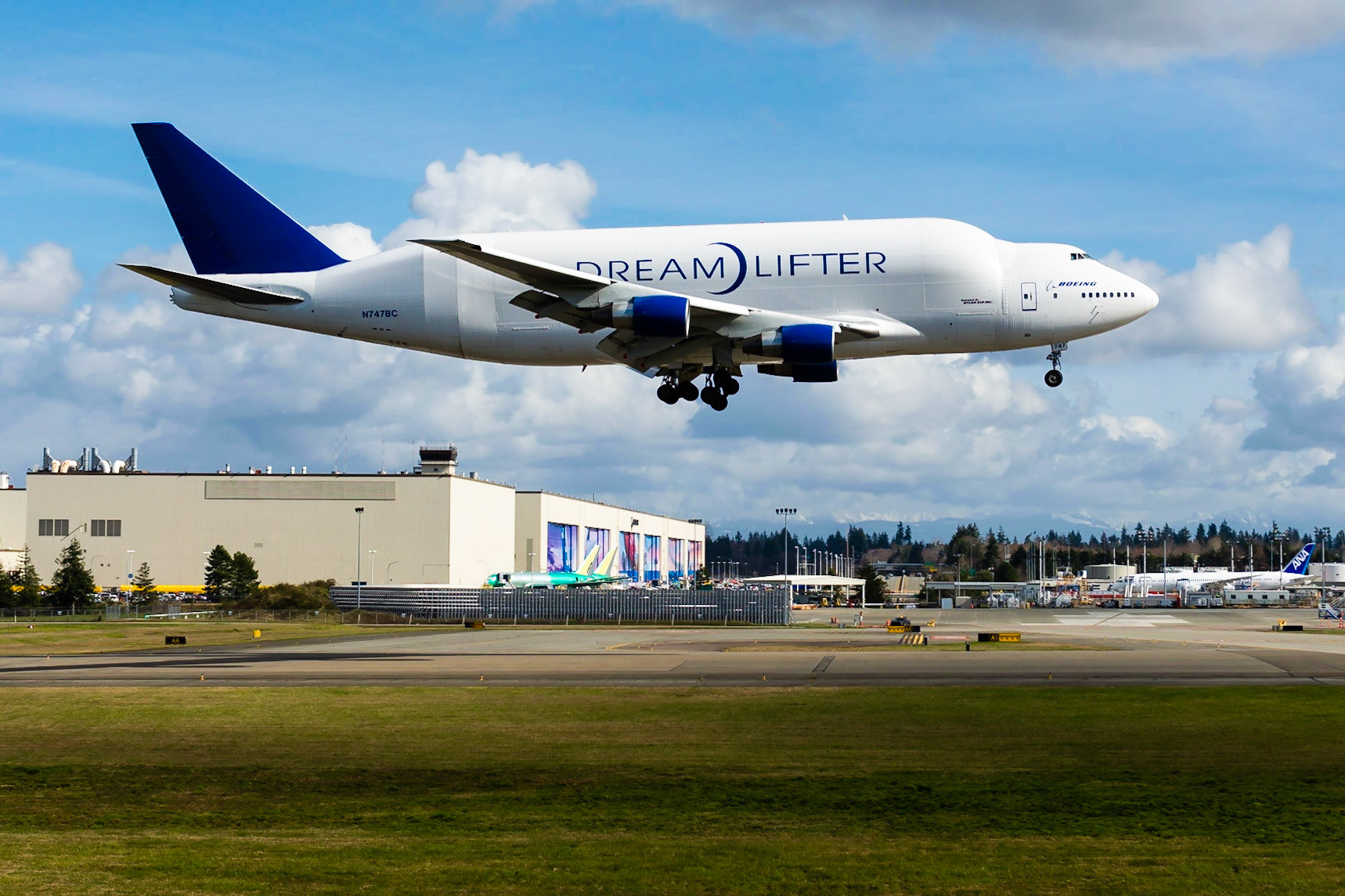 EVERETT, WASHINGTON - MARCH 4. 2020: A Boeing 747-400 Large Cargo Freighter (LCF), known as 'Dreamlifter' is arriving with parts for the Boeing 787 program.