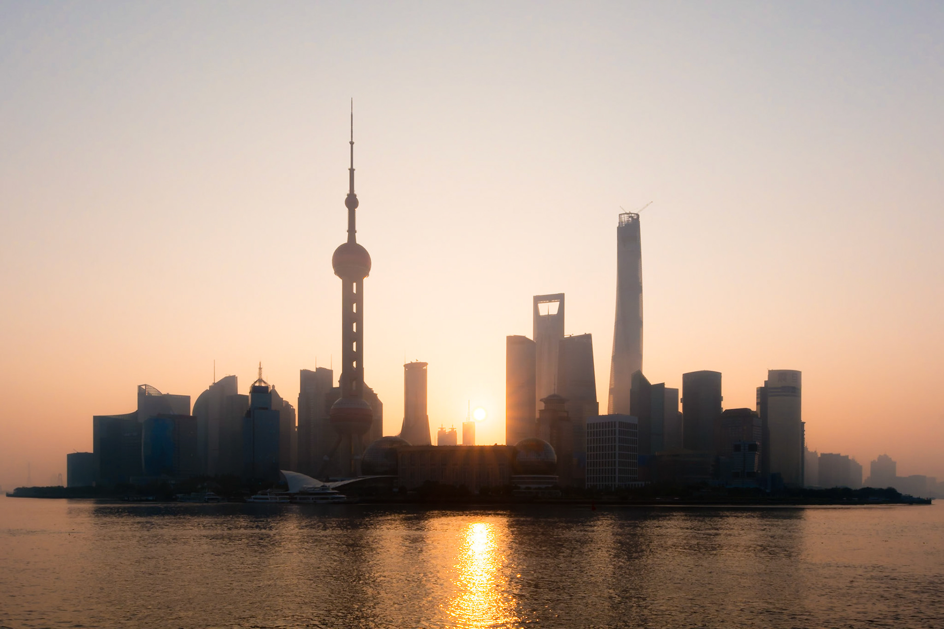Taken from the Huangpu Park on The Bund at sunrise, this was one of the clearest mornings of the year so far. In this iconoc view of modern Shanghai, you can see the Pearl Tower, distinctive Conference Centre and the new Shanghai Tower