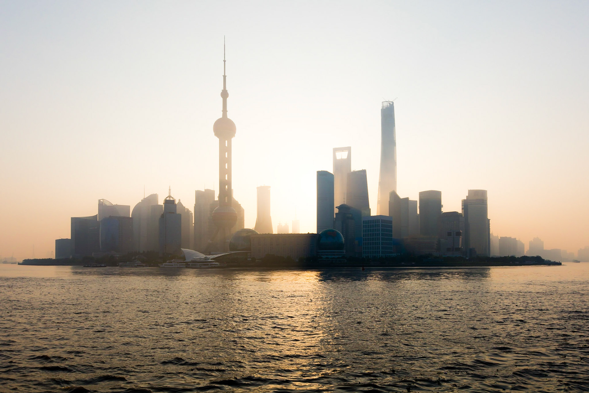 Taken from the Huangpu Park on The Bund at sunrise, this was one of the clearest mornings of the year so far. In this iconoc view of modern Shanghai, you can see the Pearl Tower, distinctive Conference Centre and the new Shanghai Tower