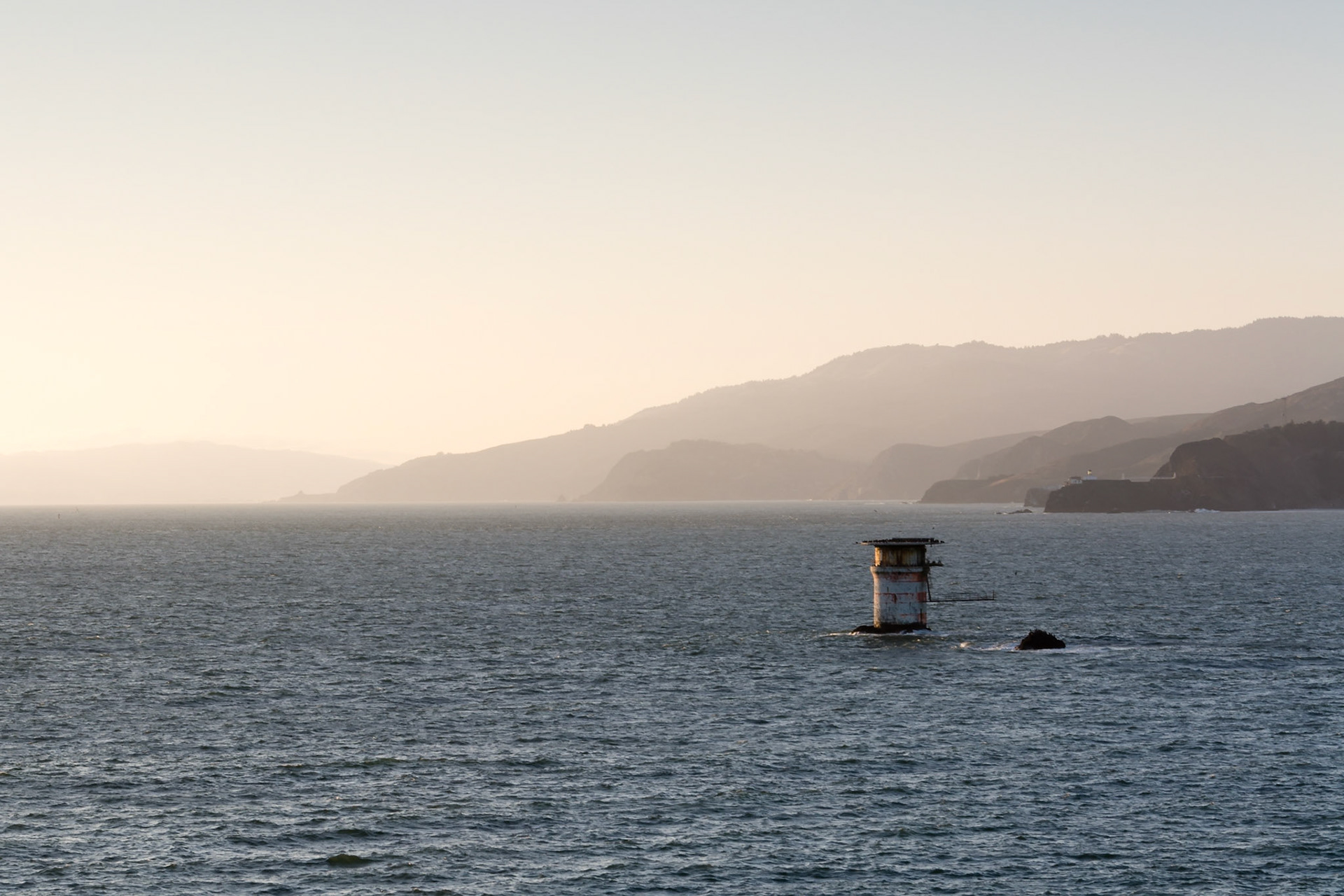 Just to the west of the Golden Gate Bridge is the Mile Rock Lighthouse.